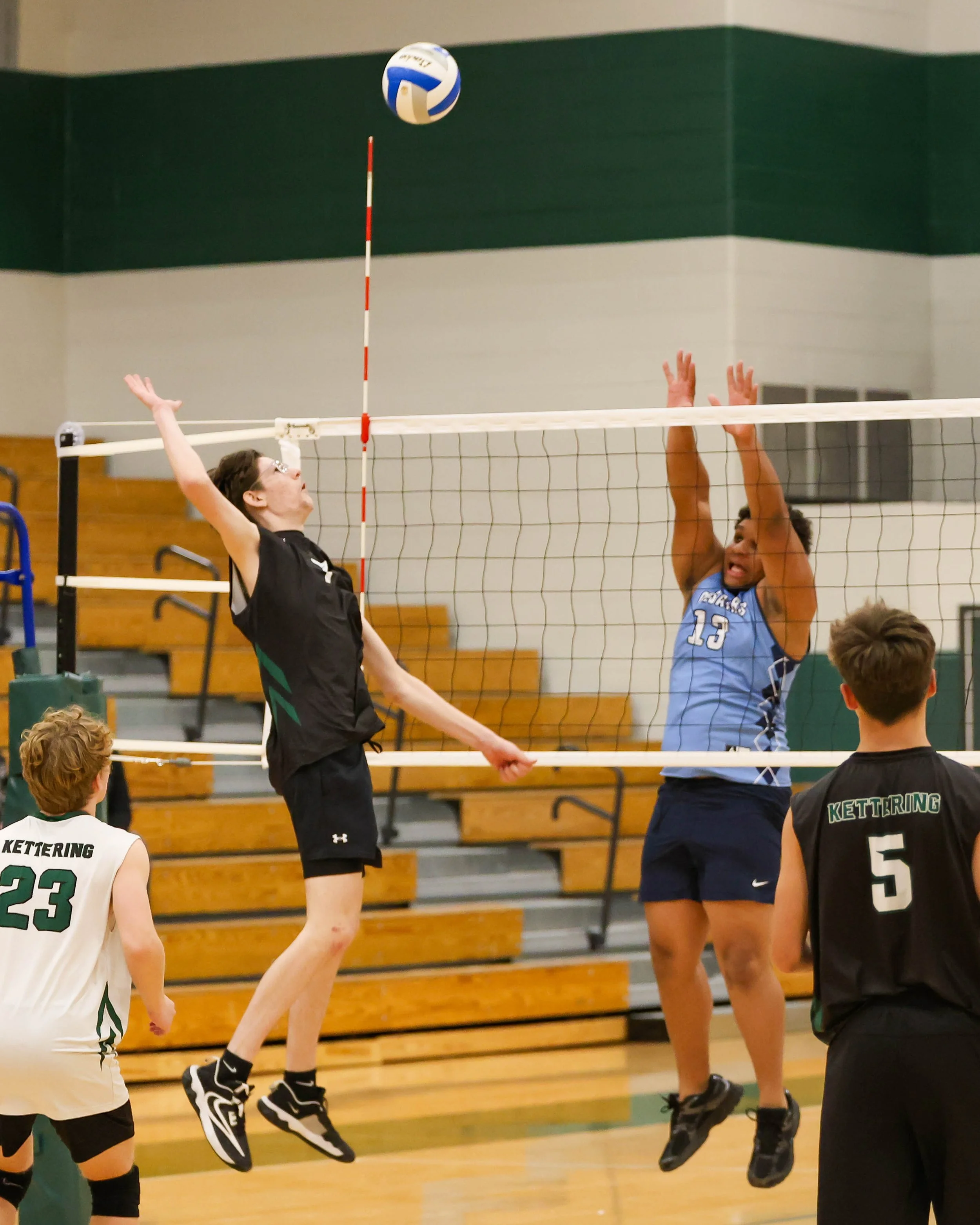 Kettering #7 waits to spike the ball