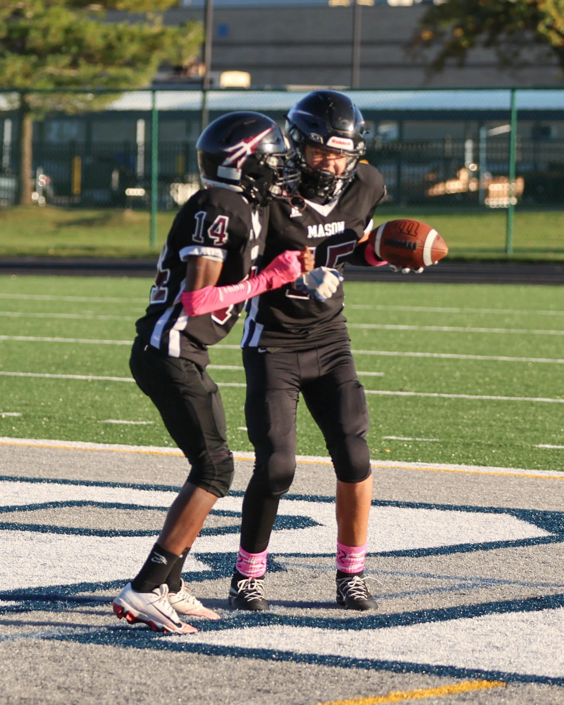 Mason #15 scores a touchdown