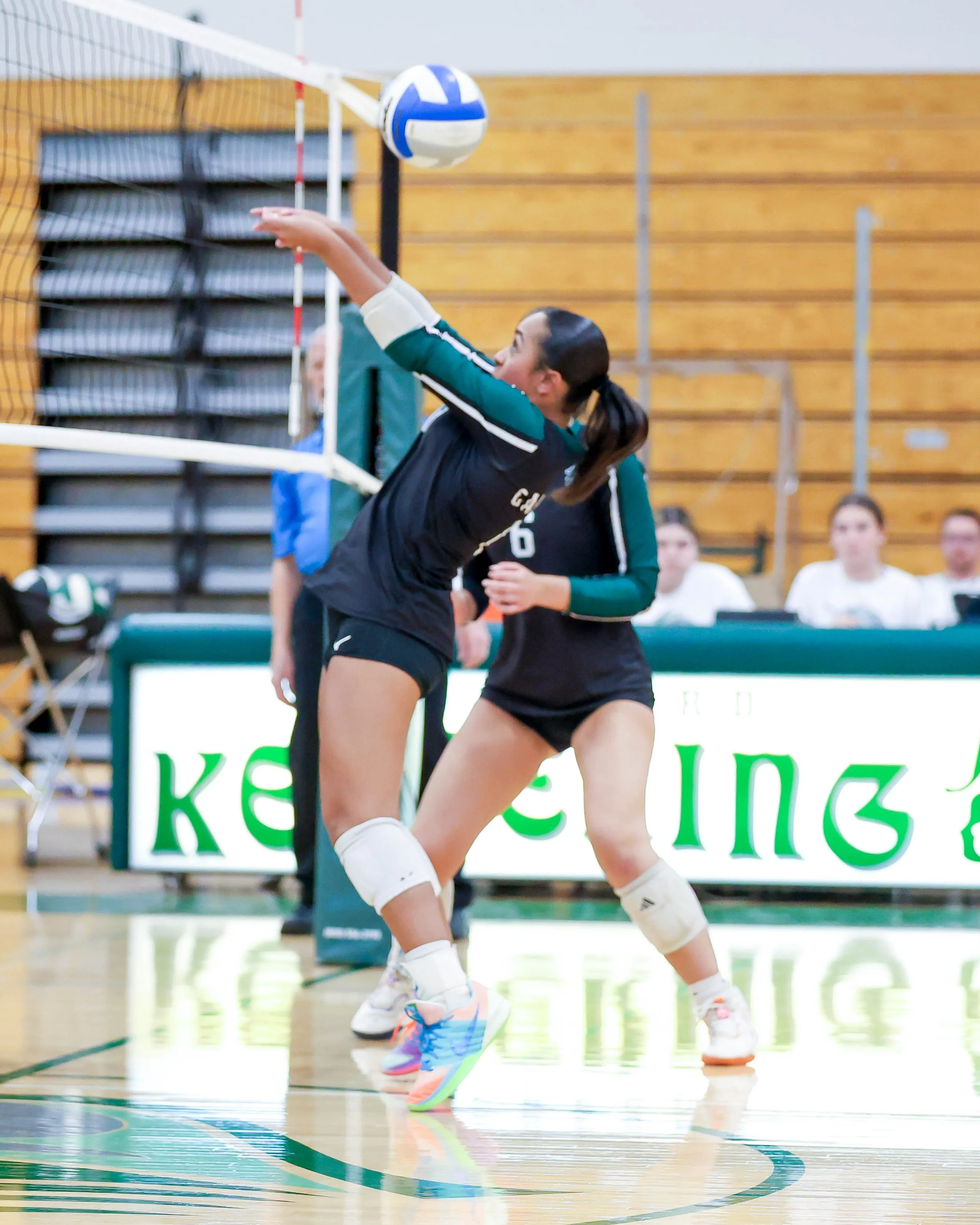 Kettering #10 hits the ball