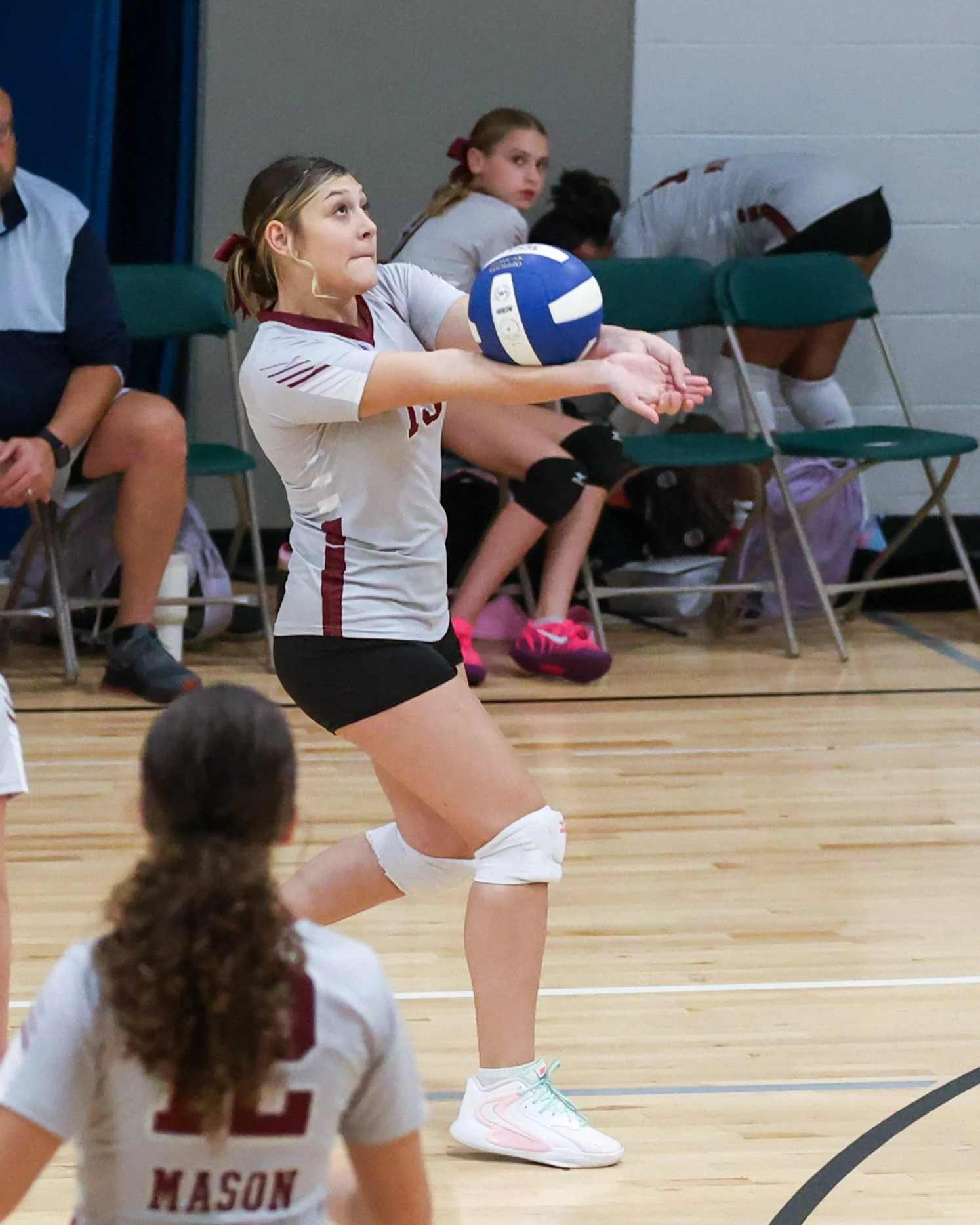 Mason girl returns the ball