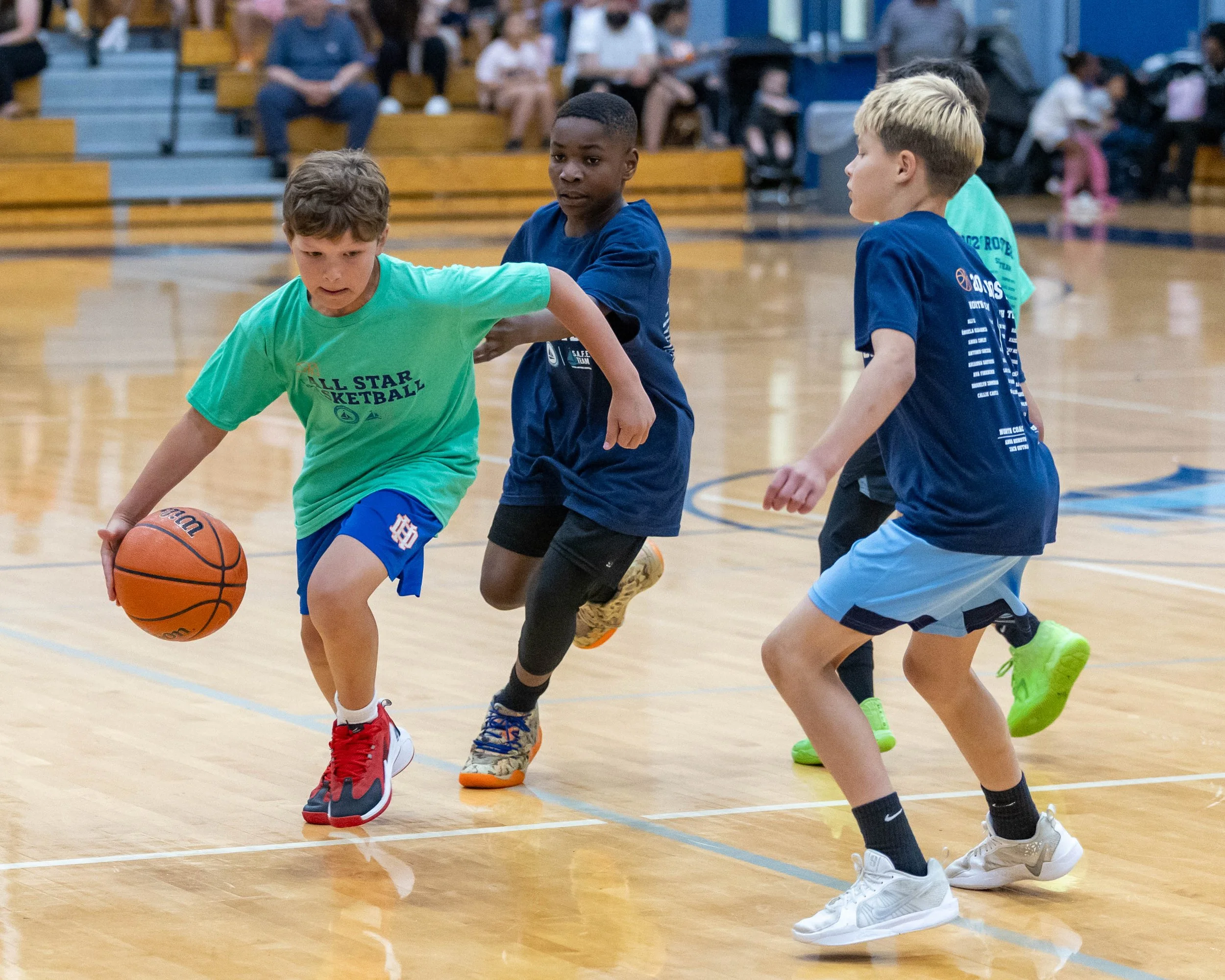 South by dribbles past a North player