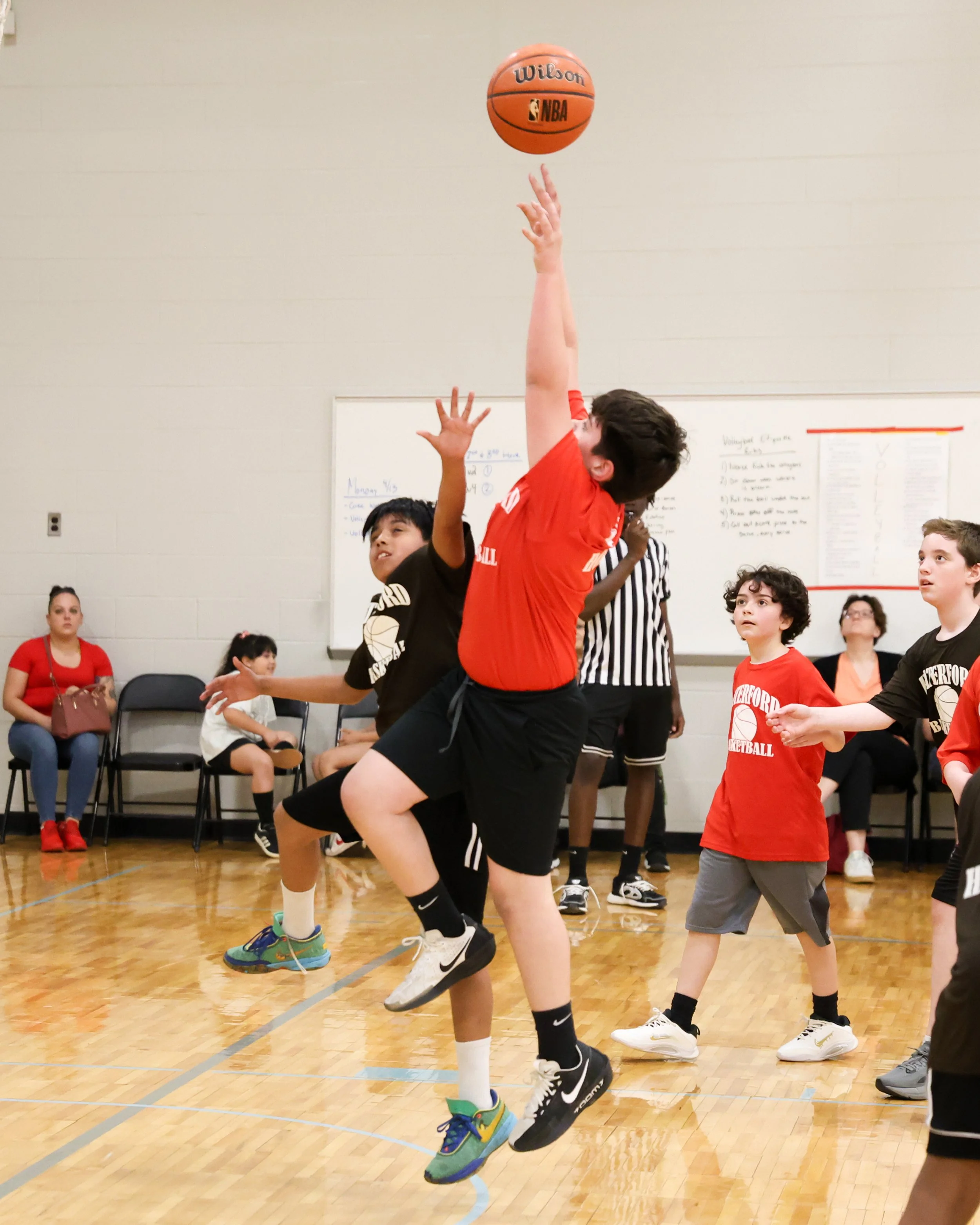 Houghton boy shoots the ball