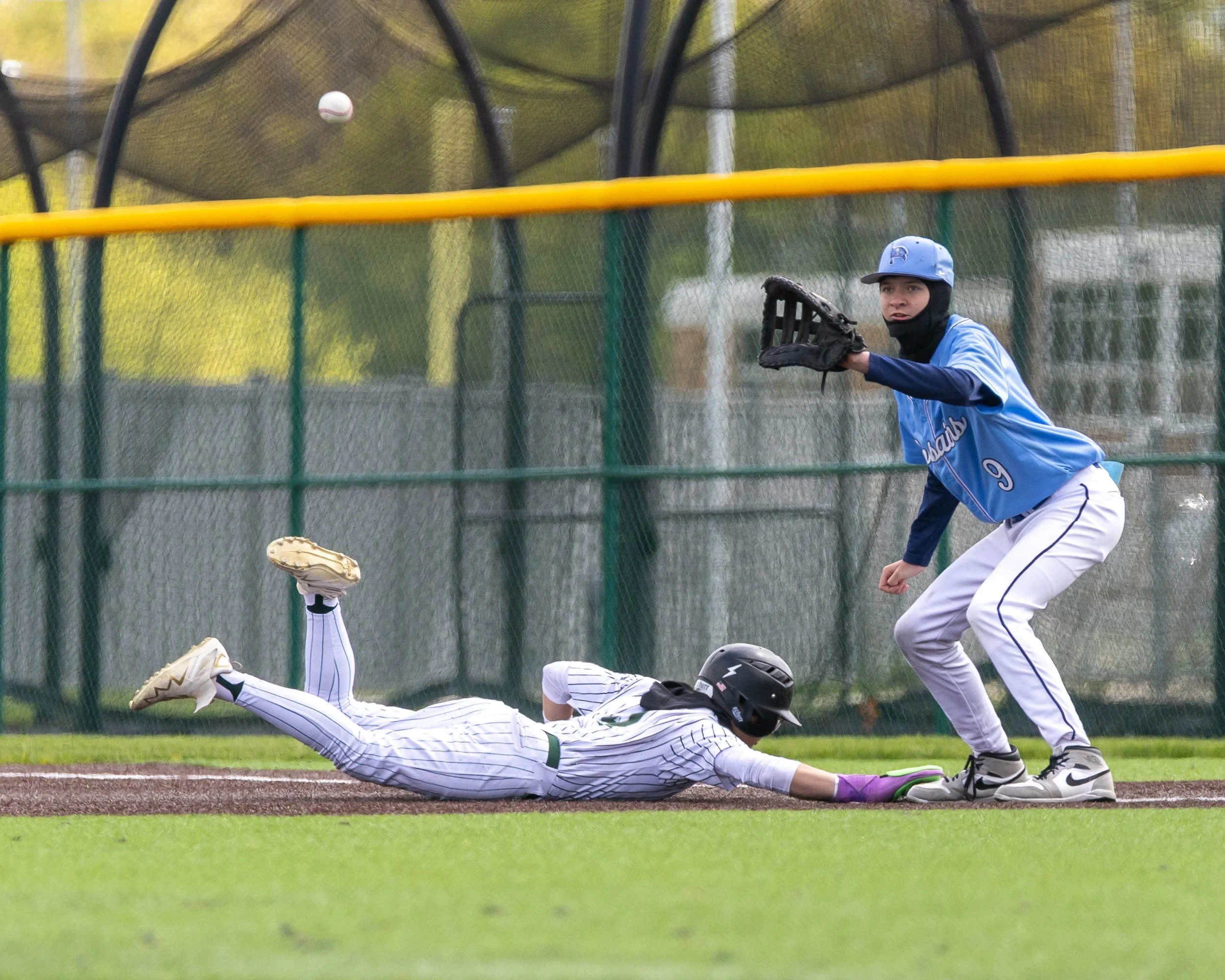 Kettering #3 heads back to 1st base