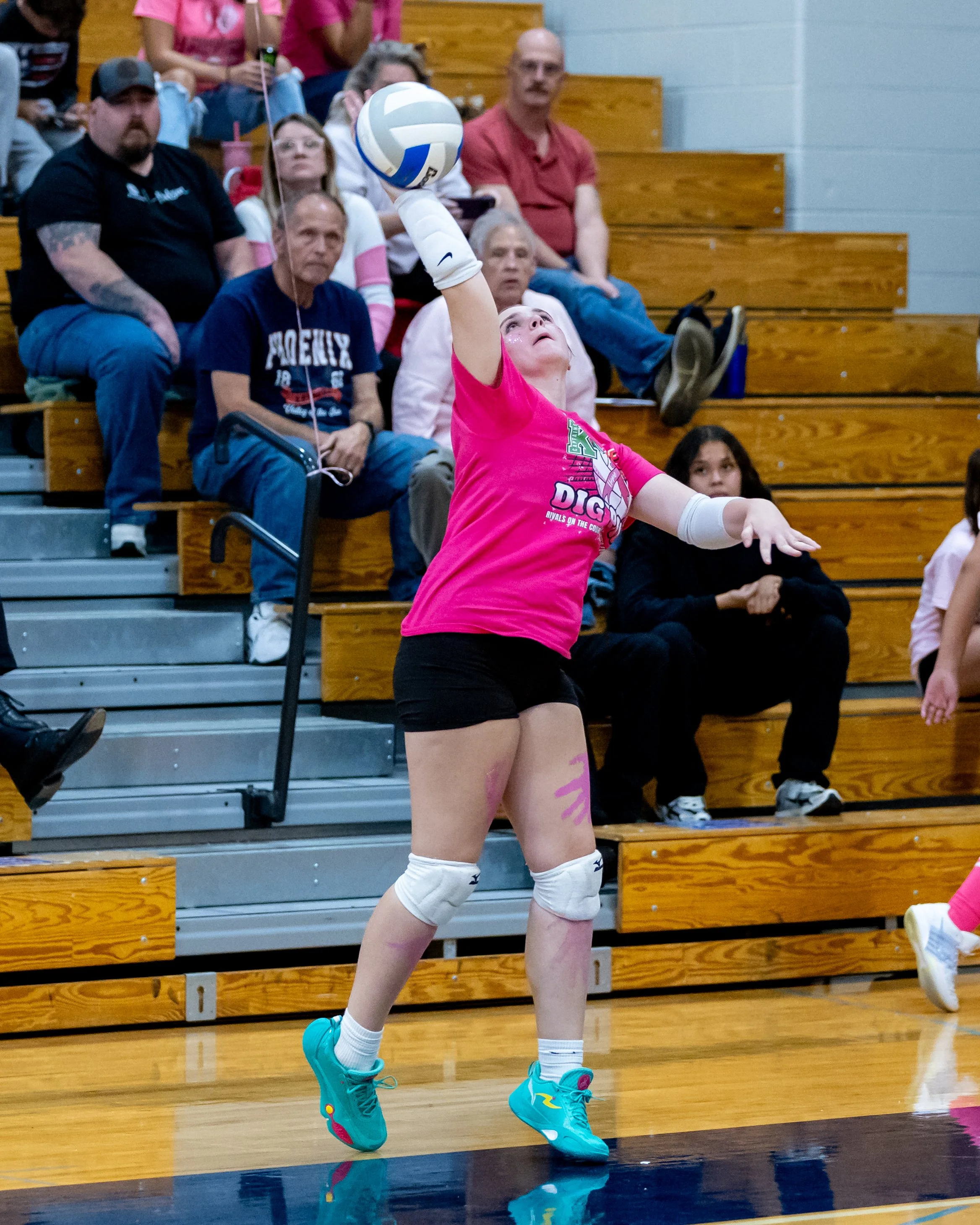 Kettering player hits the ball