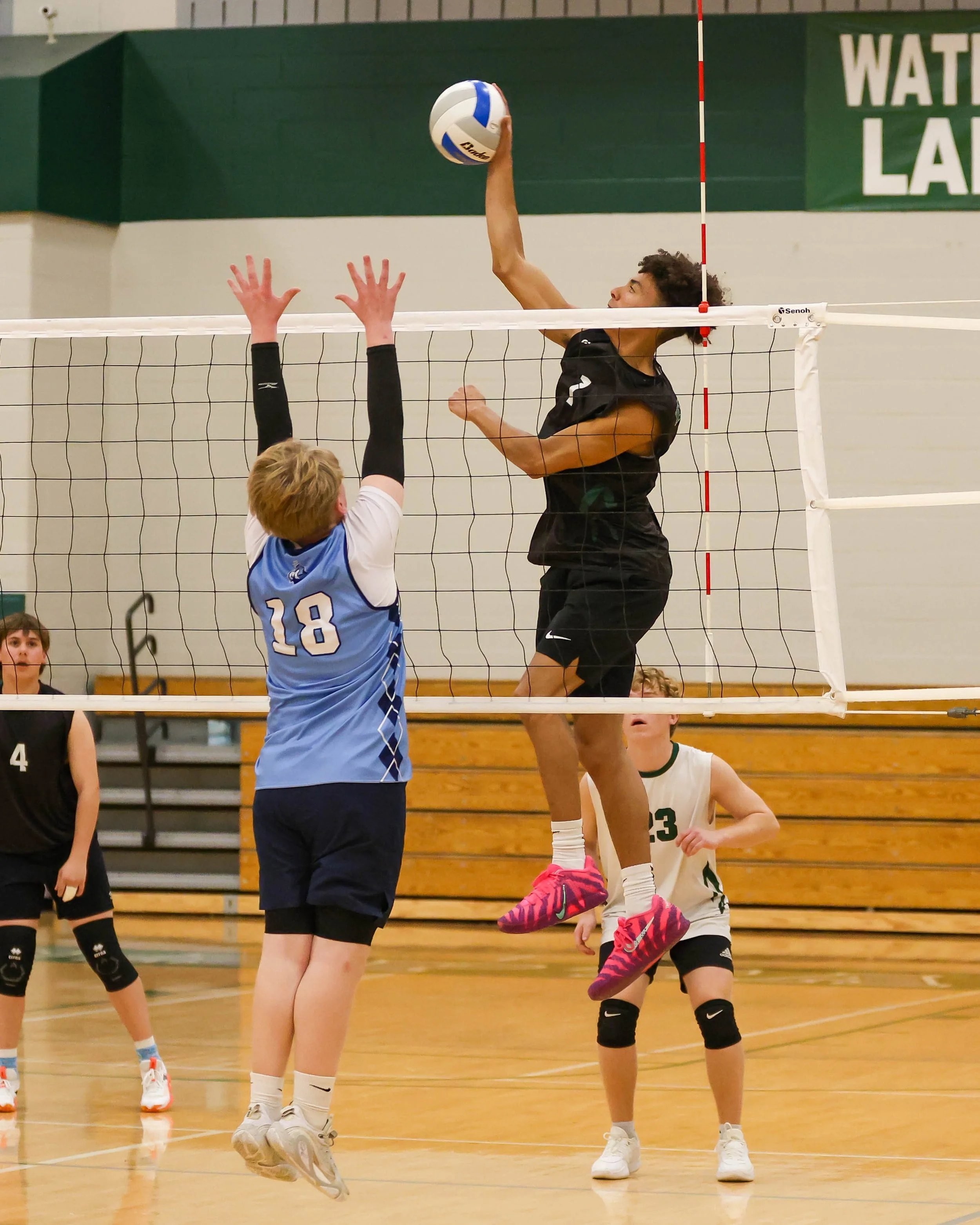 Kettering #1 taps there ball over the net