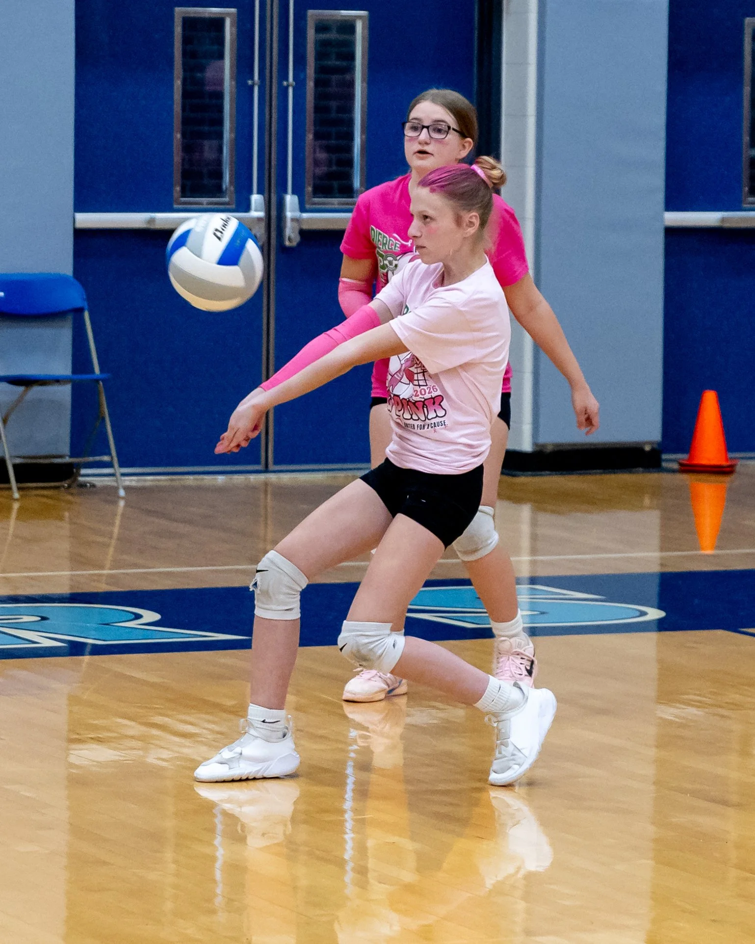 Pierce player hits the ball