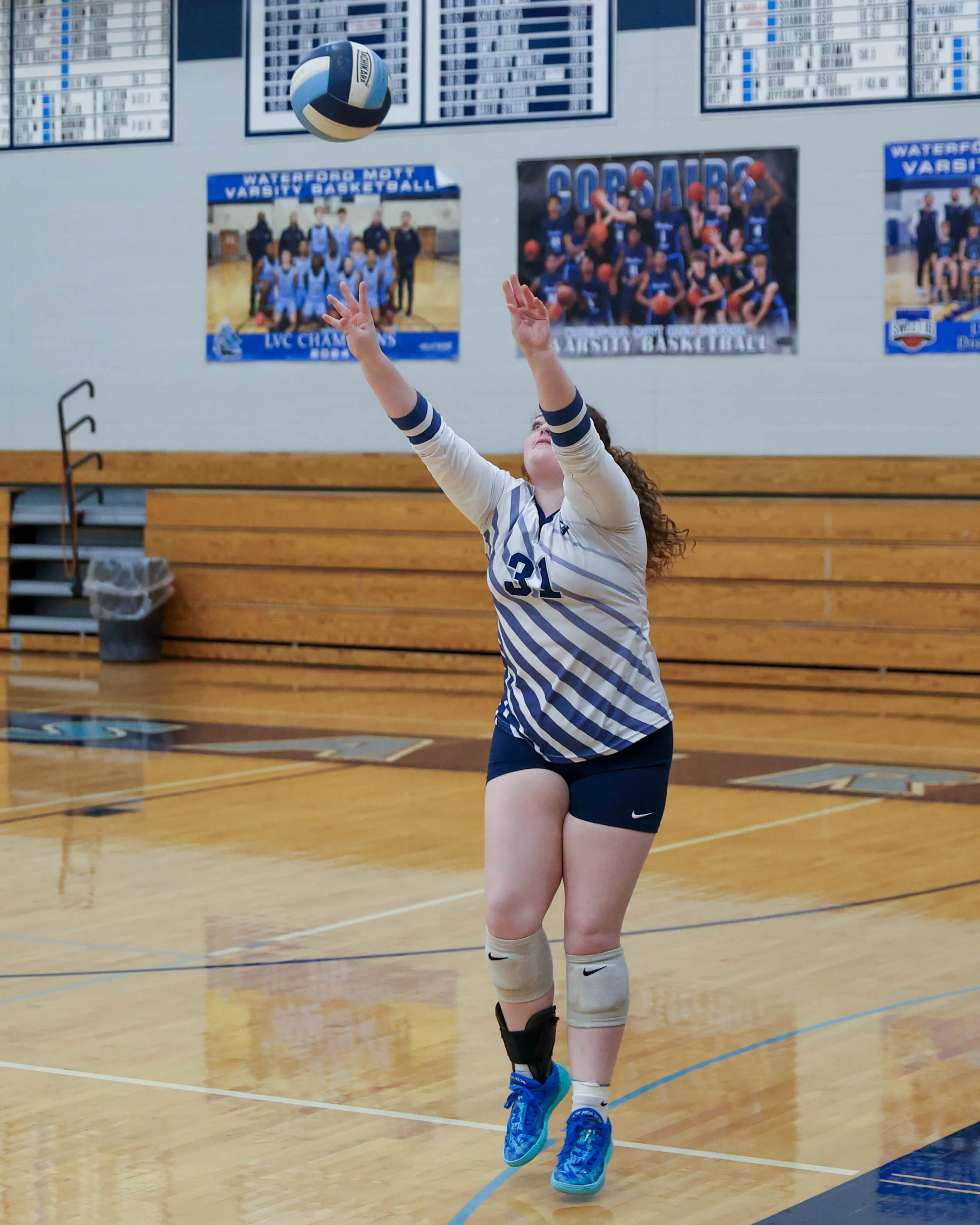 Mott #31 returns the ball