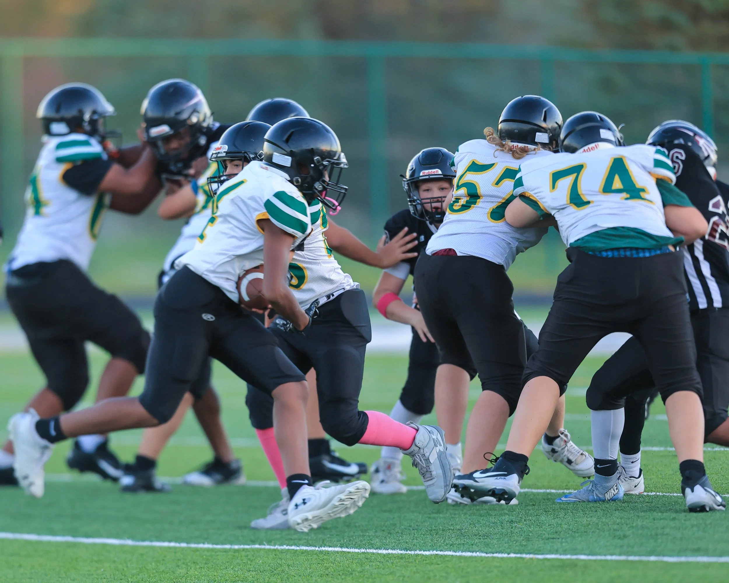 Pierce #4 carries the ball 