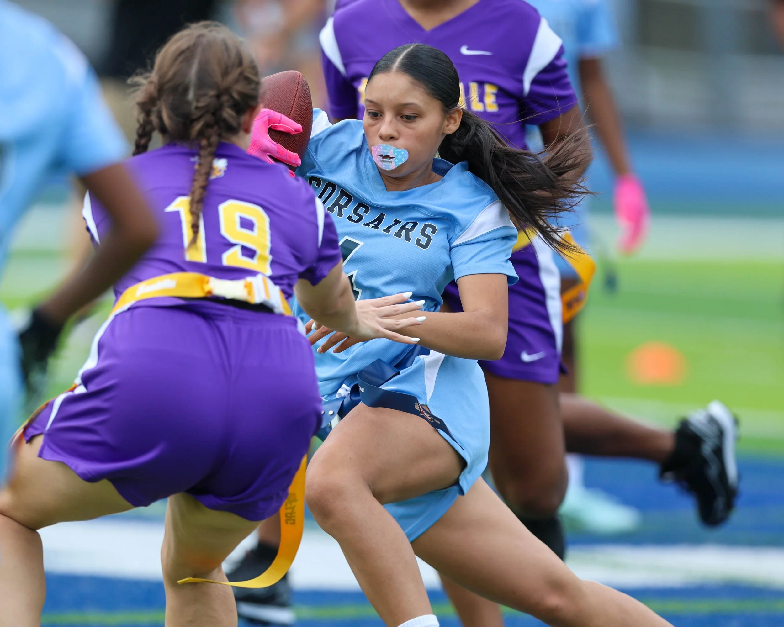 WM #4 with the ball between defenders