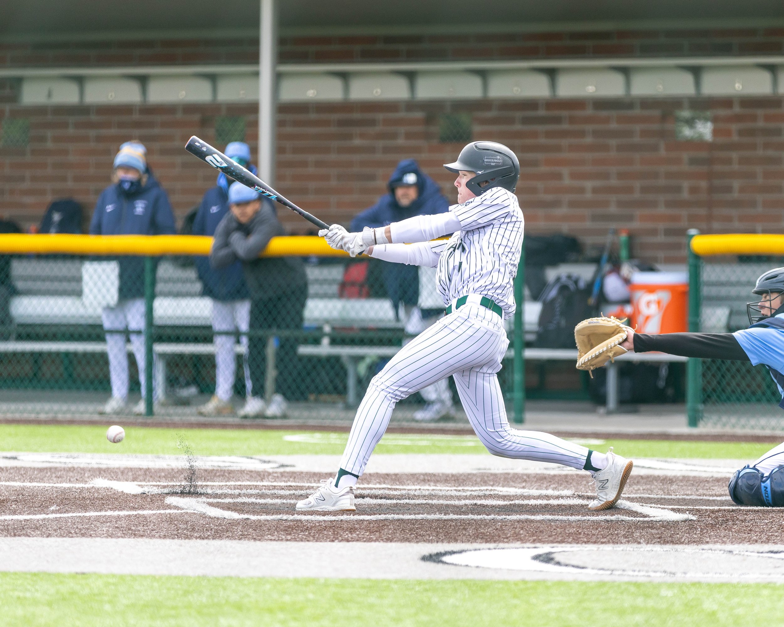 Kettering batter hits a ground ball