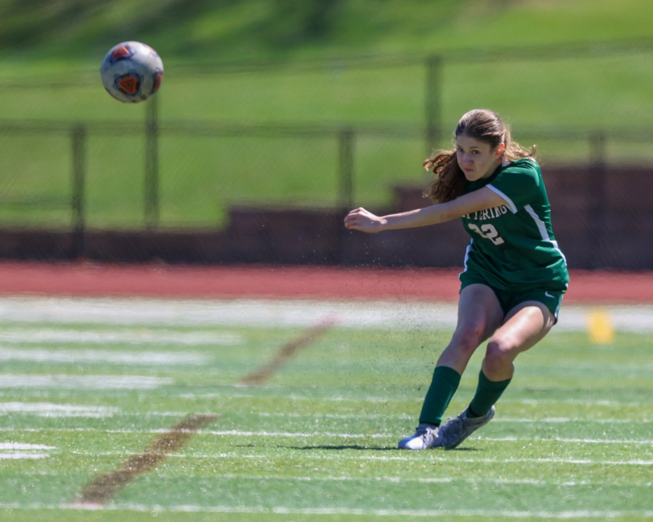 #22 with the free kick ball in air