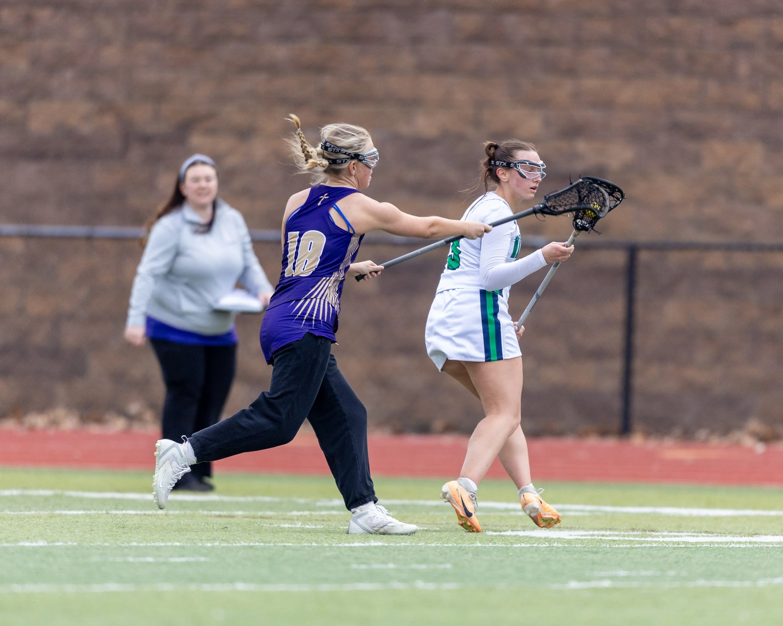 #3 turns to the left to protect the ball