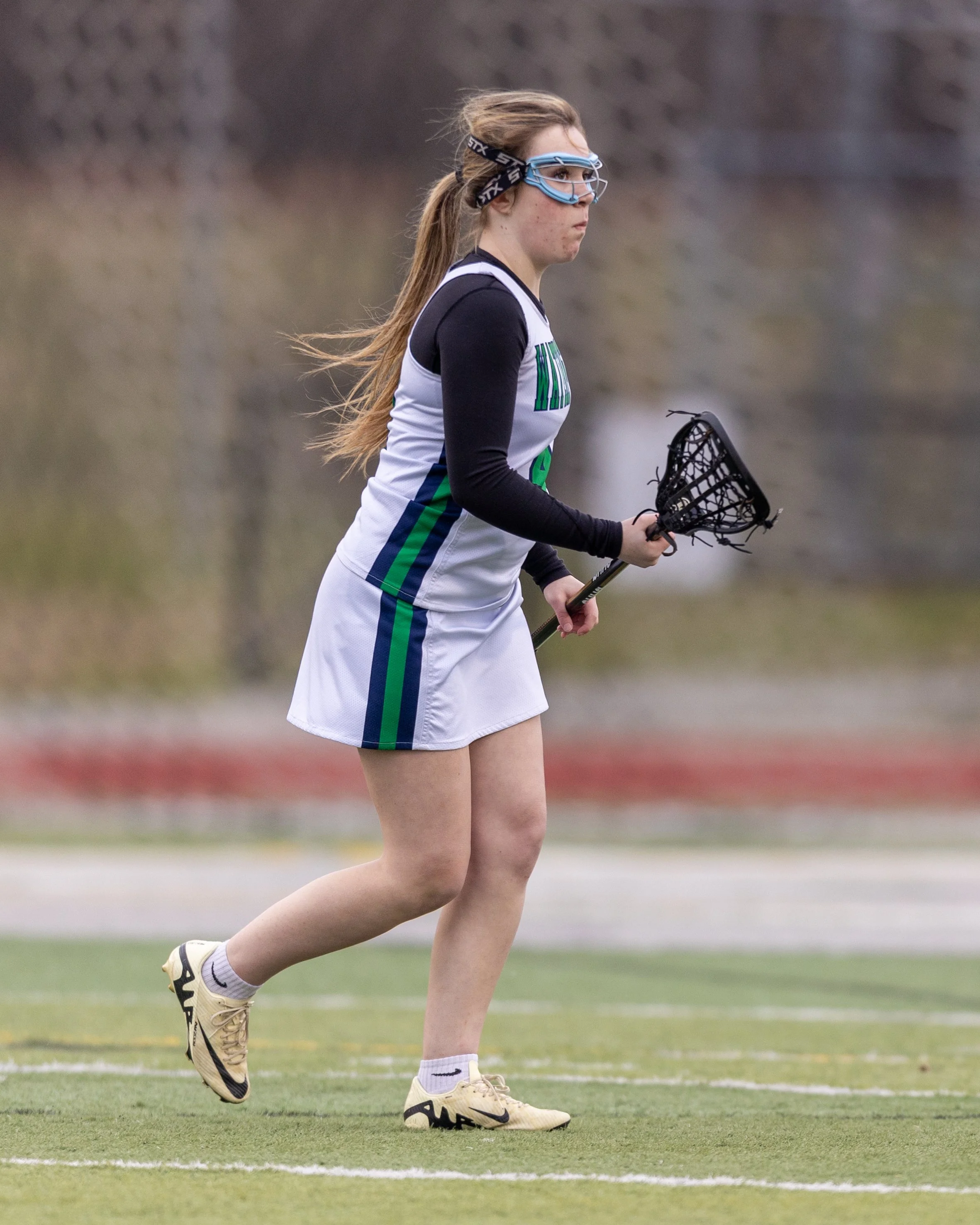 #12 carries the ball