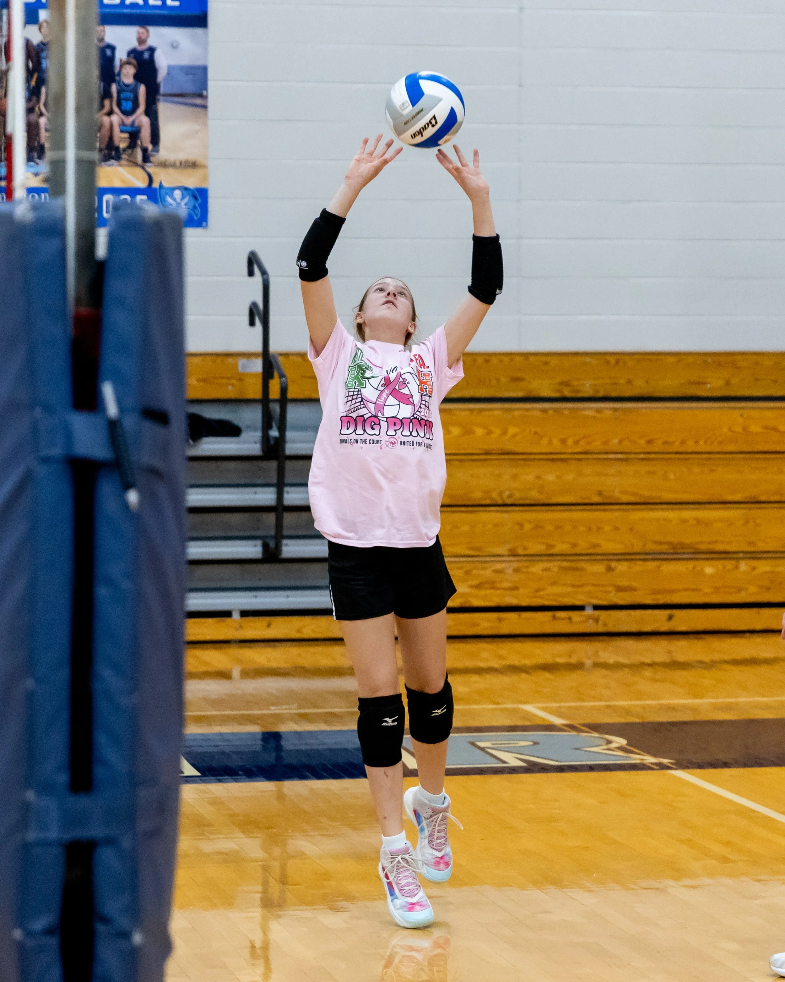 Kettering player hits the ball