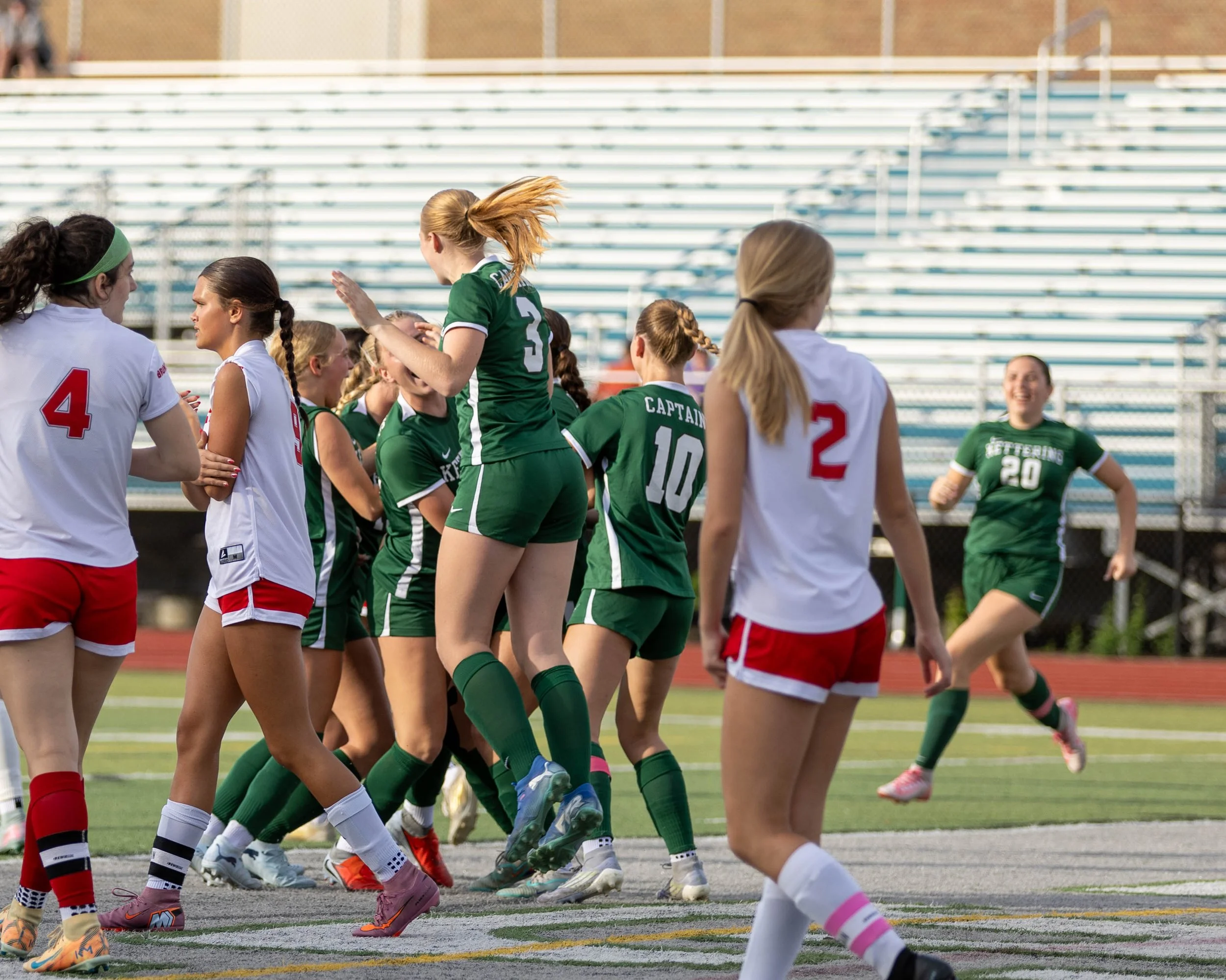 Captains celebrate the goal