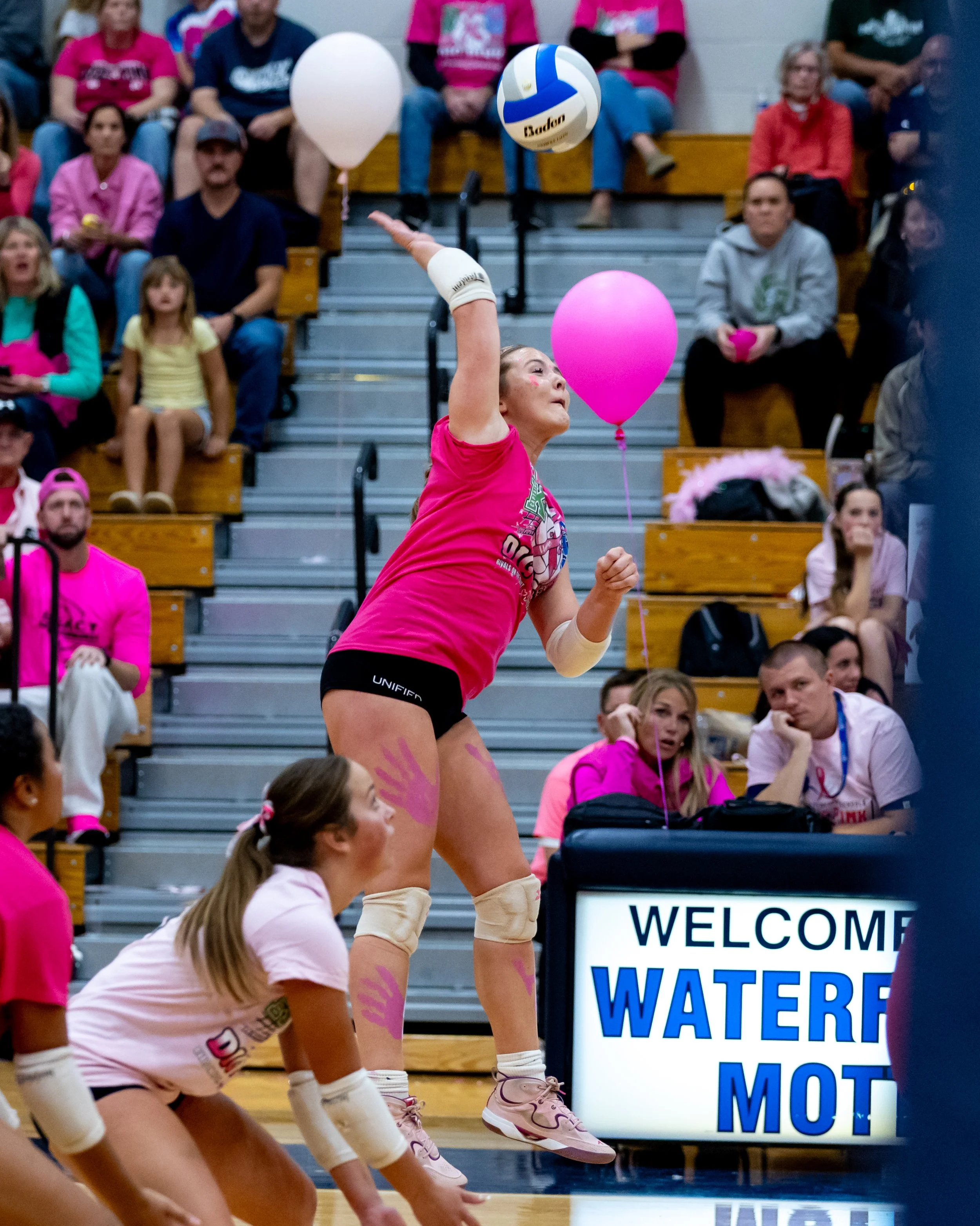 Kettering player hits the ball