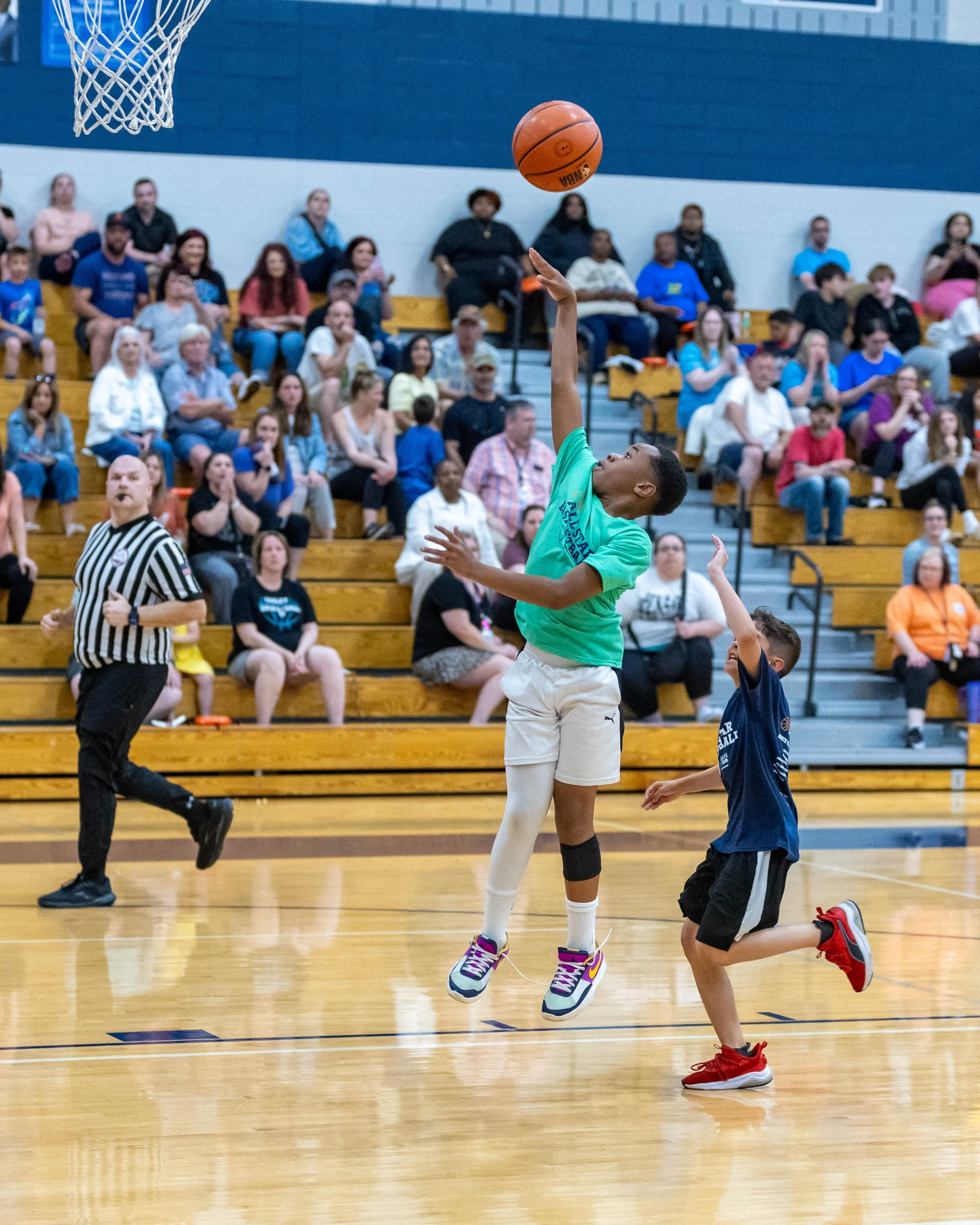 South boy shoots the ball