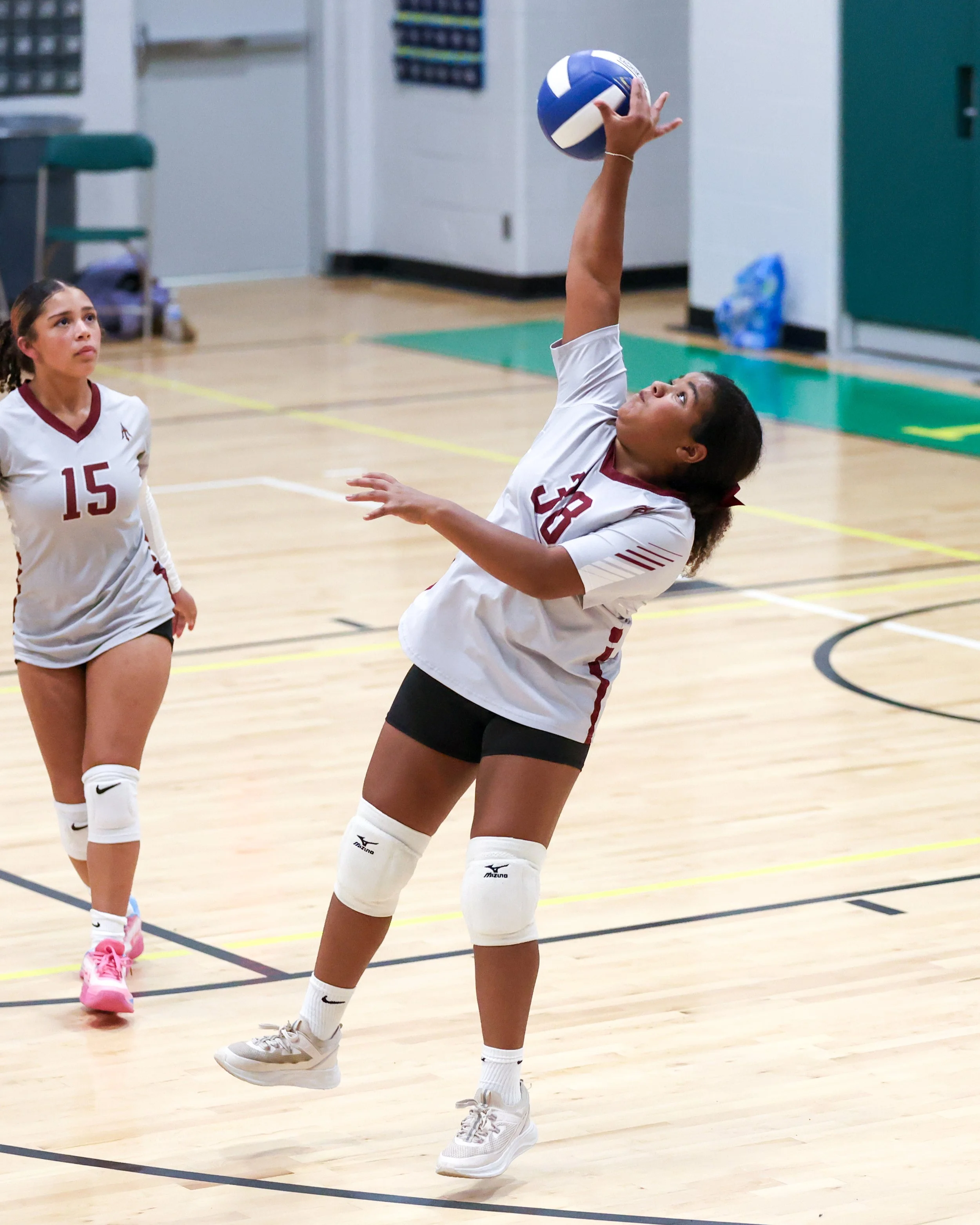 Mason girl returns the ball