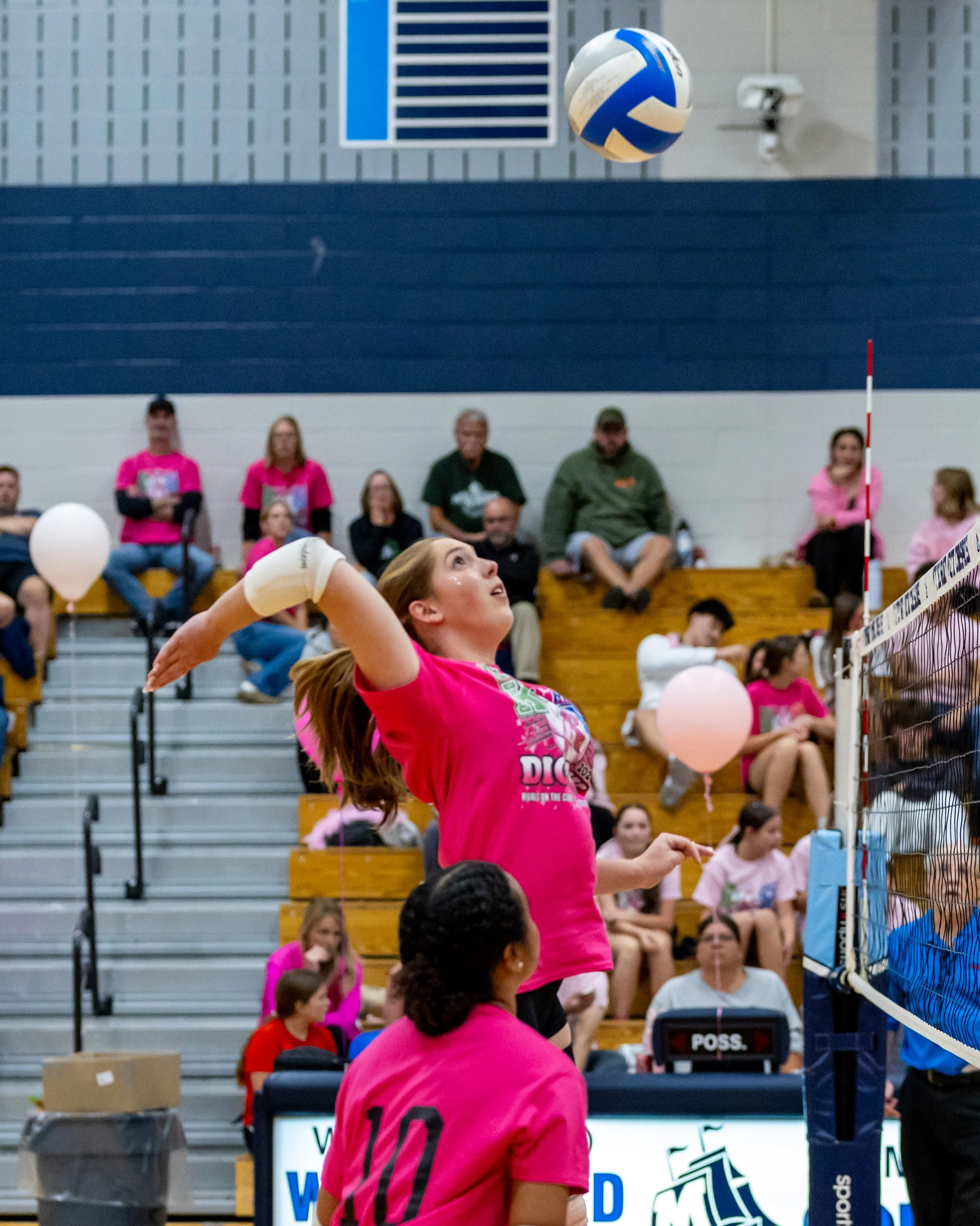 Kettering player hits the ball