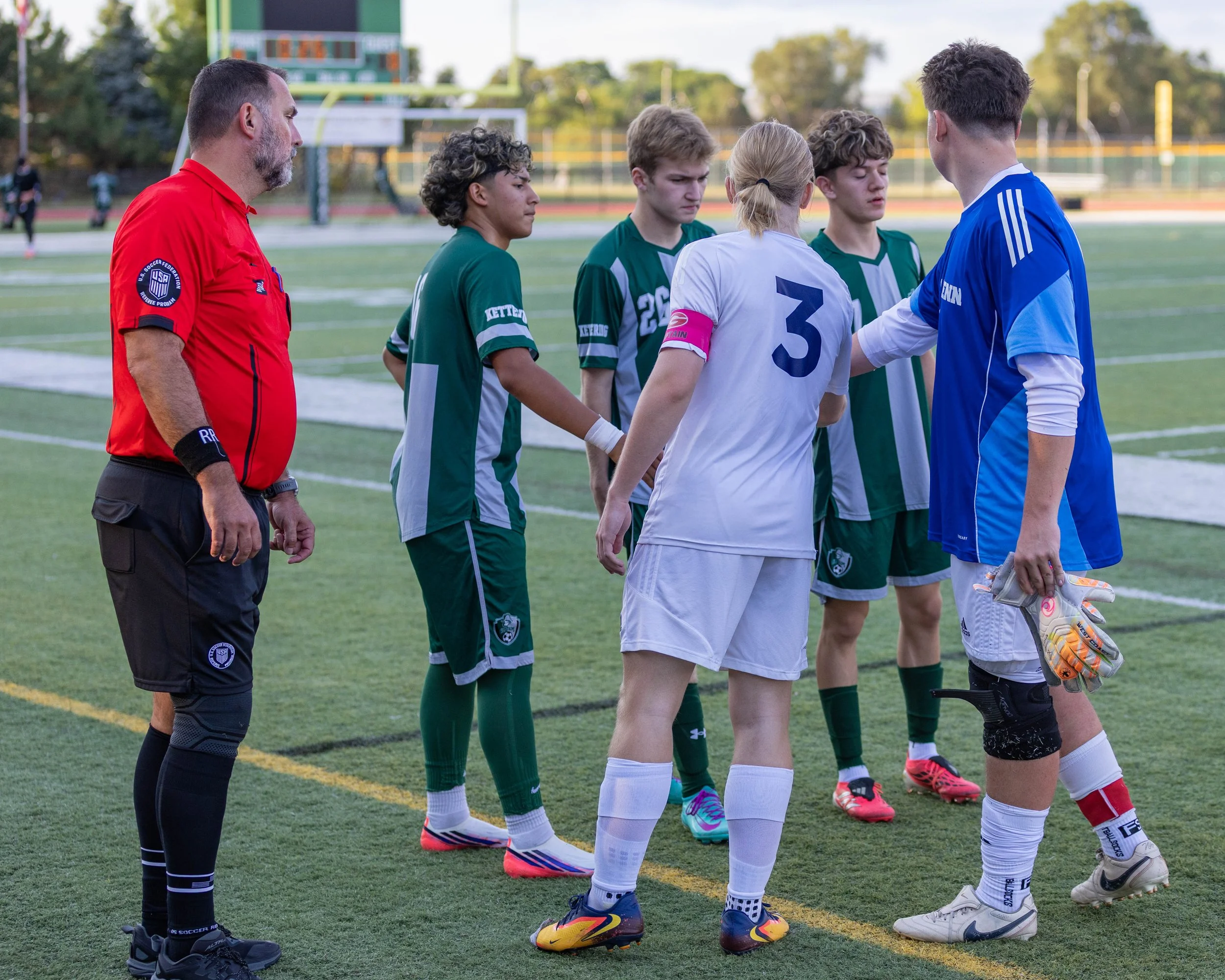 Team Captians meet before game 