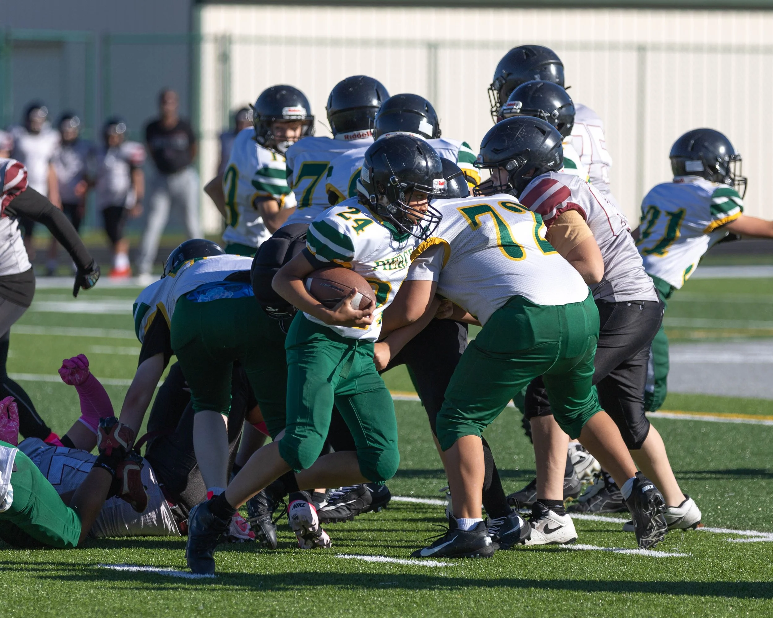 Pierce #24 runs with the ball