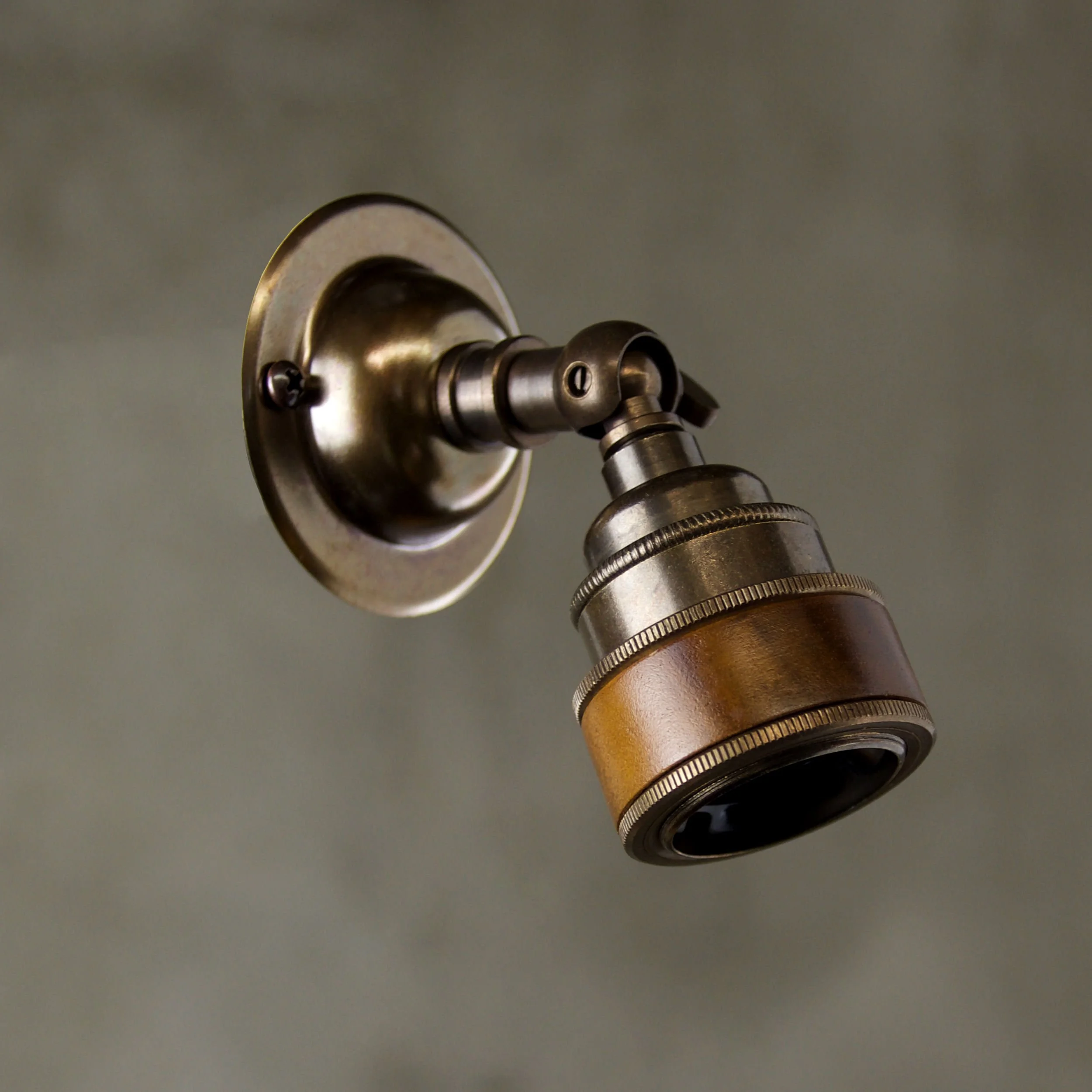 Knuckle No.6 antique brass wall light with turned mango wood