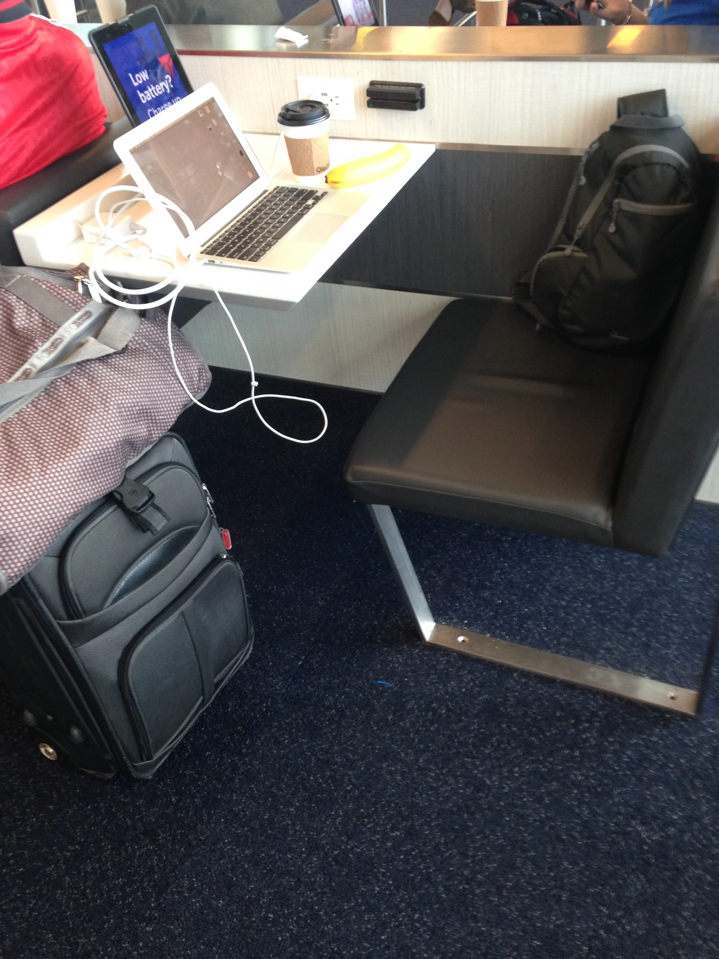 Computer/tablet friendly desk at Delta gate in Laguardia Airport.