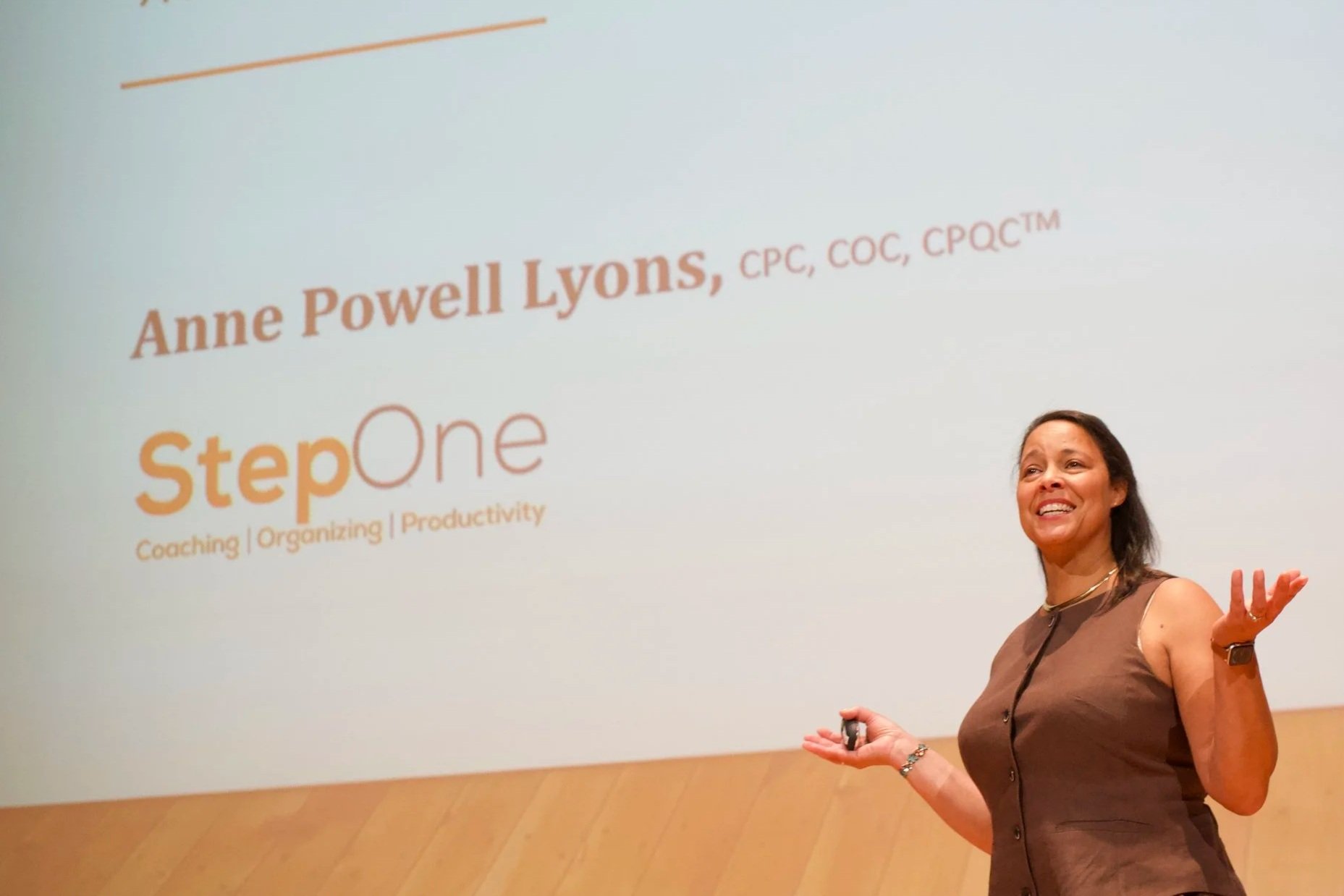 Anne Lyons speaking to an audience at a workshop