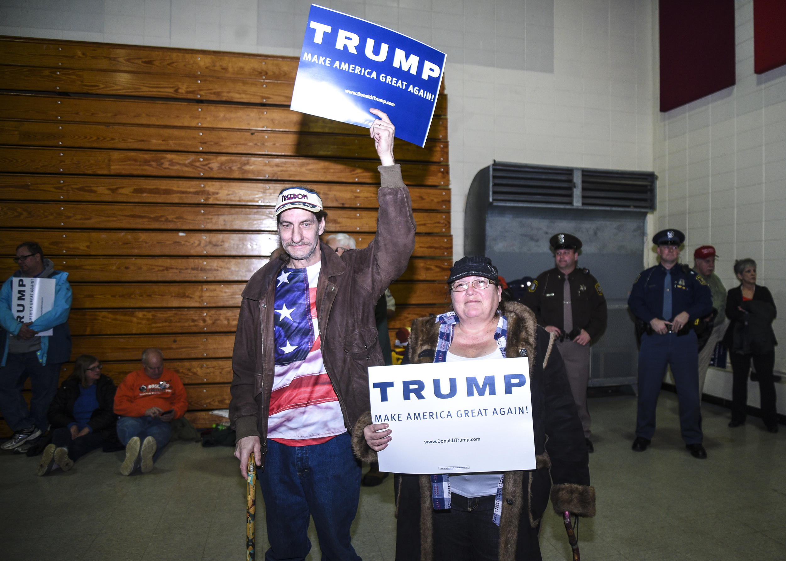  Andrew Emory and his wife Machelle Emory hold signs in support of Donald Trump for president during the rally at the Wexford County Civic Center Friday, March 4, 2016 in Cadillac, Mich. 