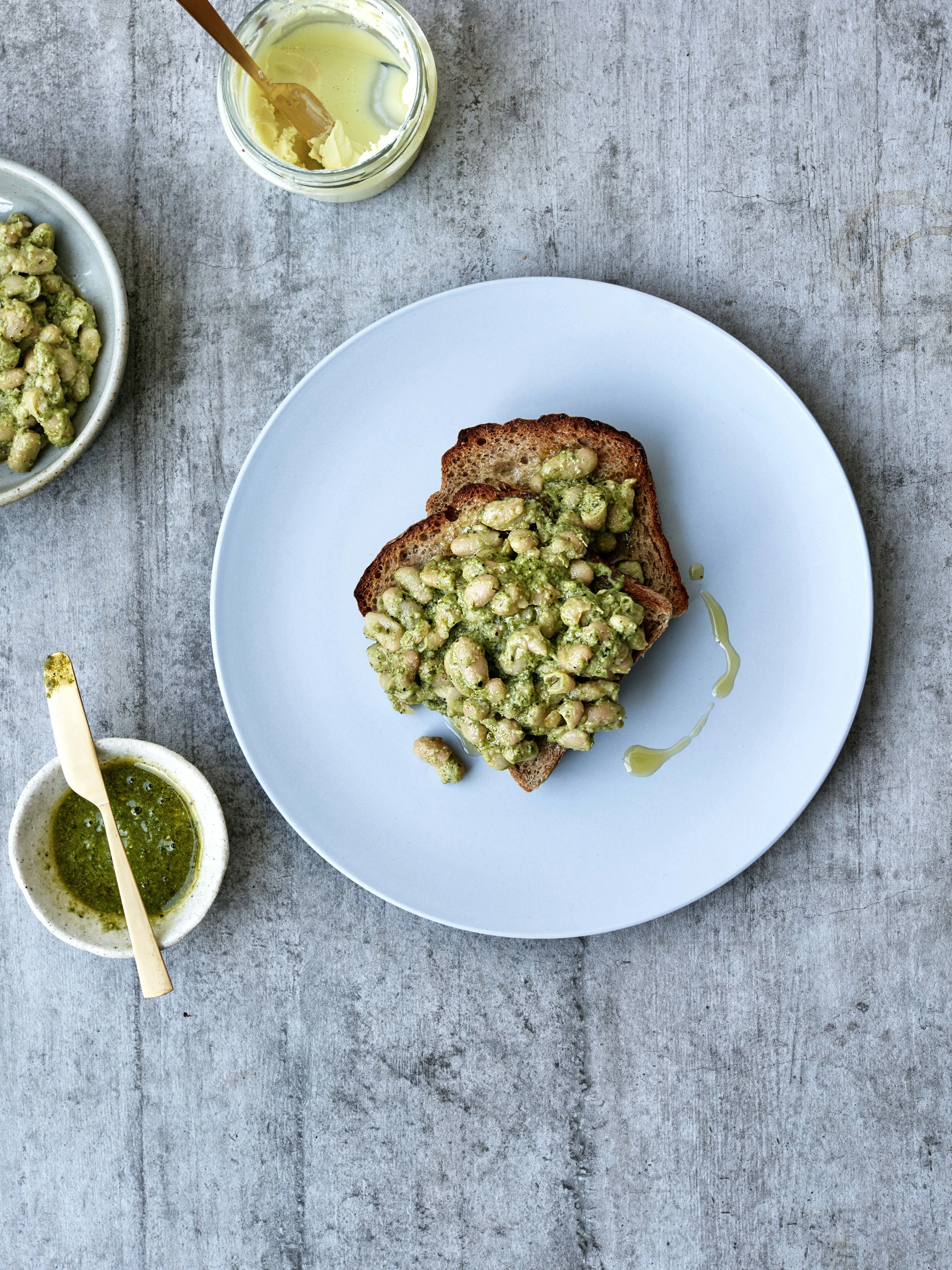 Pesto Beans on Toast // Kenkō Kitchen. Photography by Elisa Watson , styling by Kate Bradley (Kenkō Kitchen).