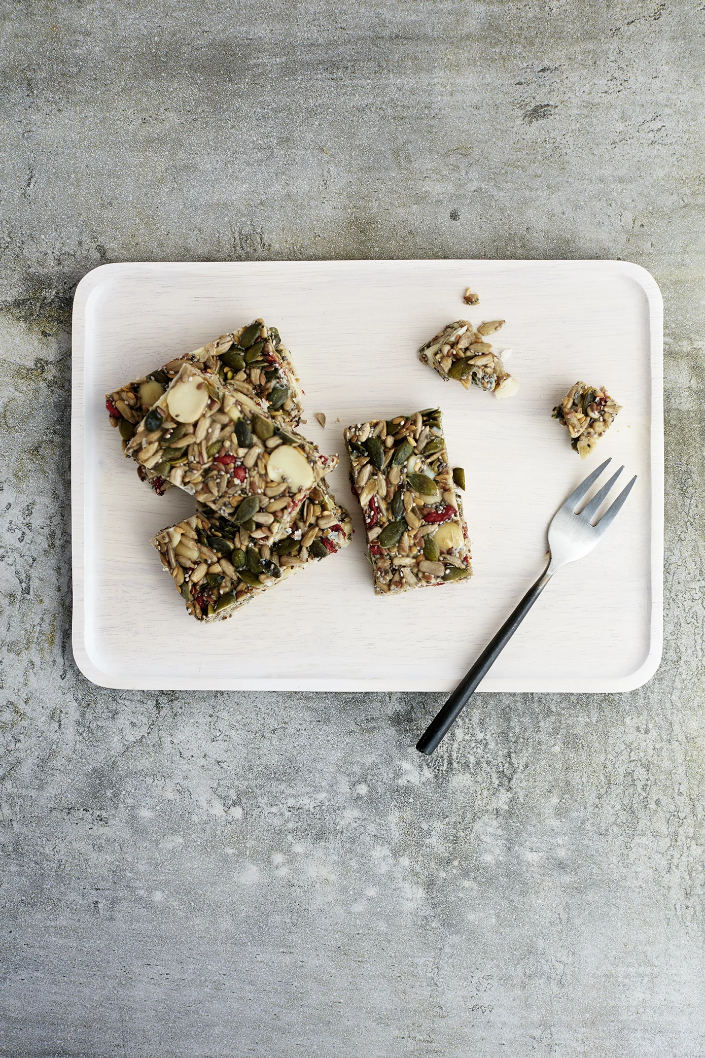 Breakfast Seed Bars // Kenkō Kitchen. Photography by Elisa Watson , styling by Kate Bradley (Kenkō Kitchen).
