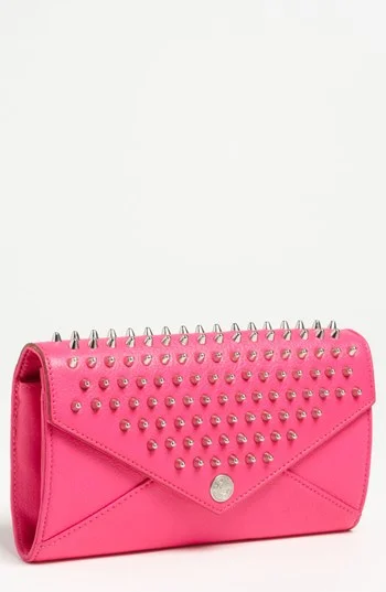 Rebecca Minkoff Studded Wallet on a Chain, $225. Great cross body bag to carry your essentials with a pop a color!