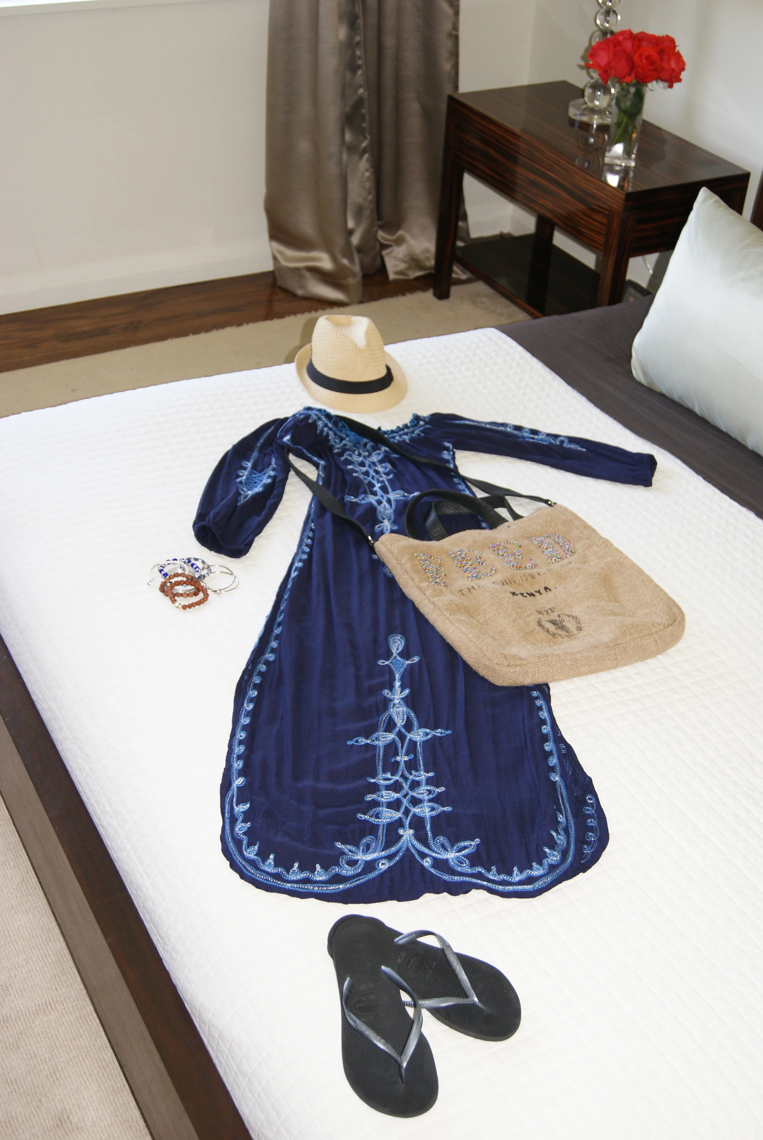 Embroidered dress/cover-up by Poupette St. Barth , beaded Feed 2 Kenya messenger bag, Havaianas, hat (farmers market), mixed bangles and beaded baubles.
