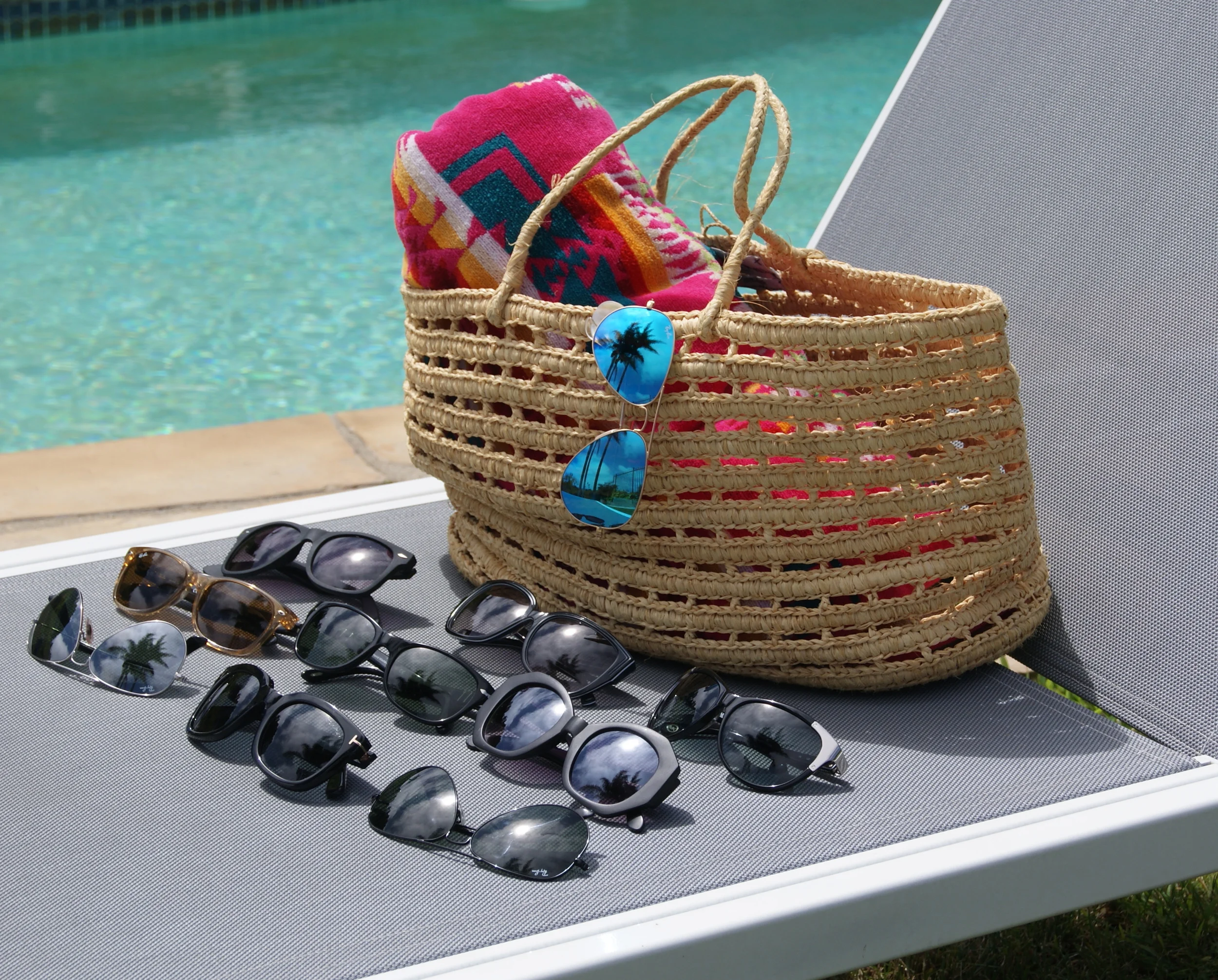 Assorted Sunglasses by Tom Ford, Ray-Ban, SALT, Marc by Marc Jacobs and others!Bag: Annabel Ingall Austrailia. Towel: Pendleton Home Collection.