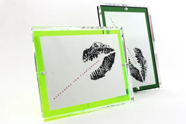 These fabulous frames will surely impress your most sophisticated and glamorous of friends. They are fun, sleek and elegant. And, who else designed them but AVF. Alexandra Von Furstenberg Snap Frame $118