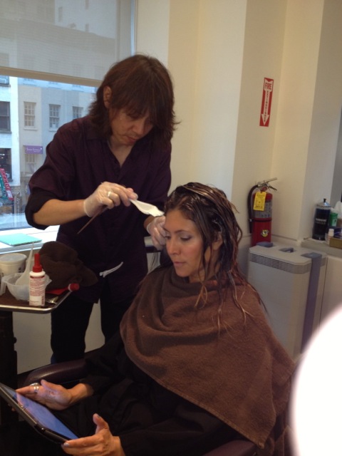 Step 2: Yuki - "I apply protection treatment starting from the roots."