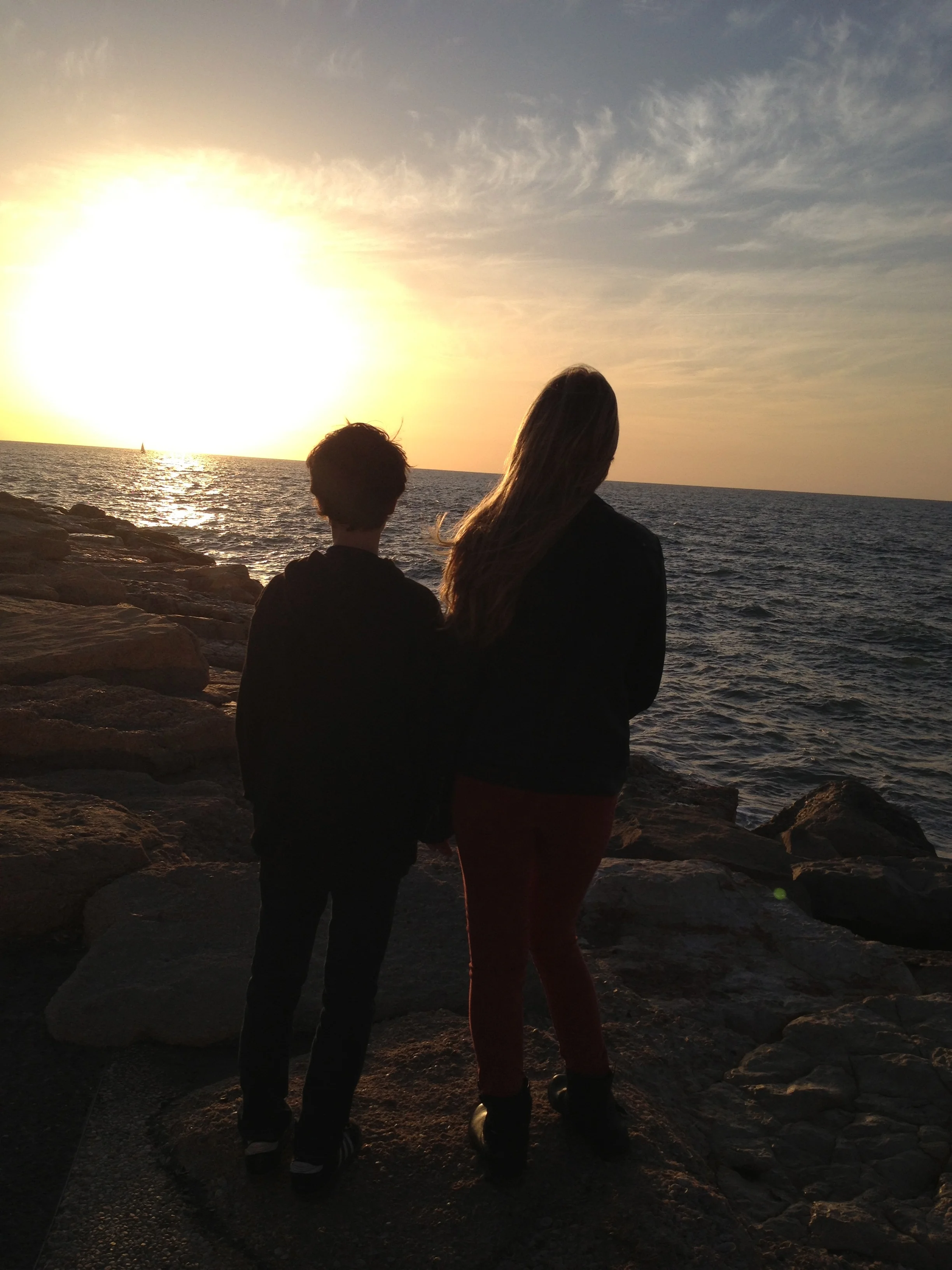 My children Alex and Rachel on the beach enjoying the sunset in Tel Aviv, Israel.