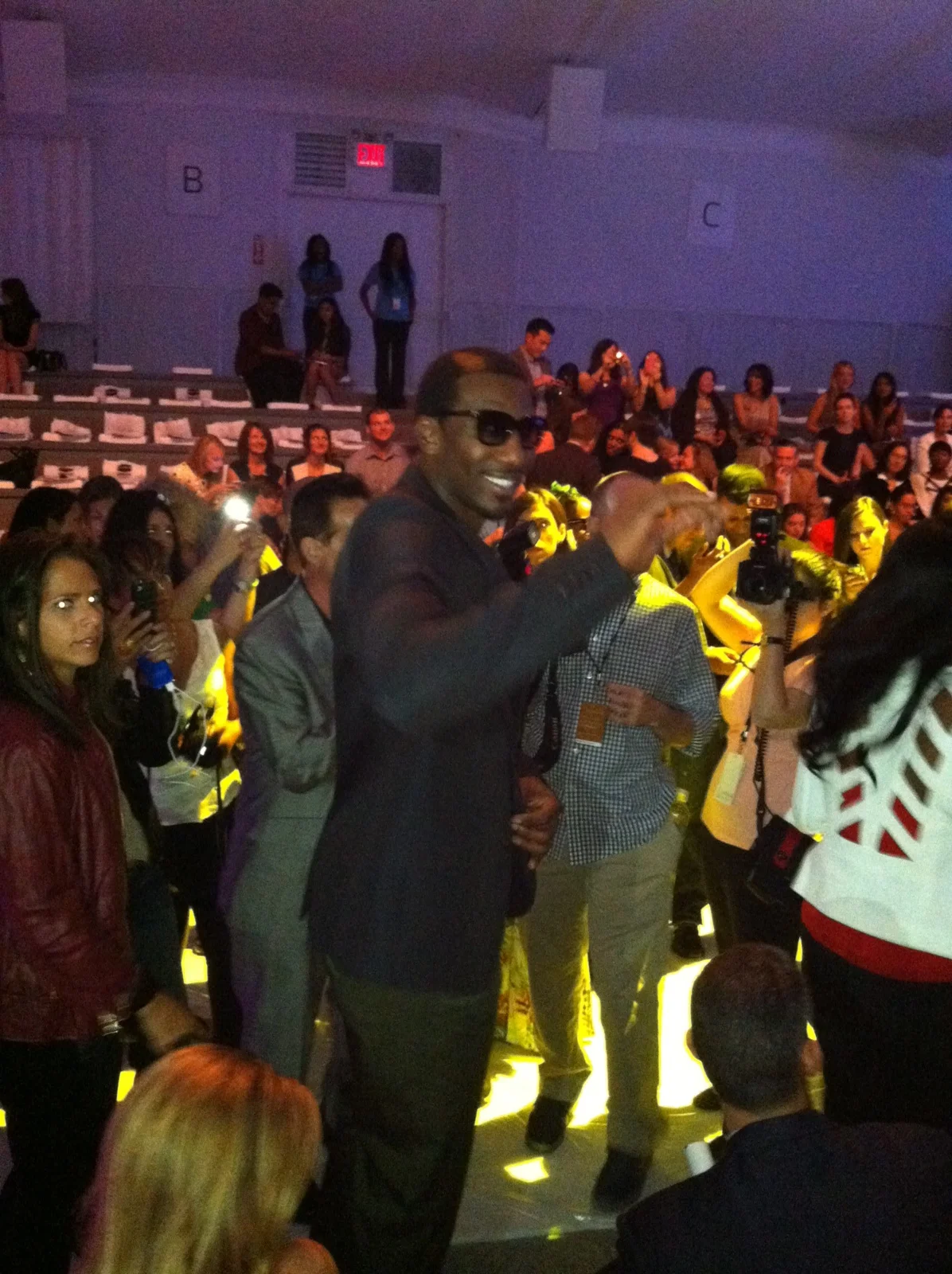 The fashionable Amar'e Stoudemire front row at the show to watch his wife strut for the Amar'e Stoudemire Foundation