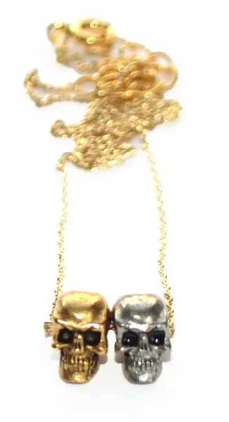Mini skulls, $125 . Perfect layering piece!