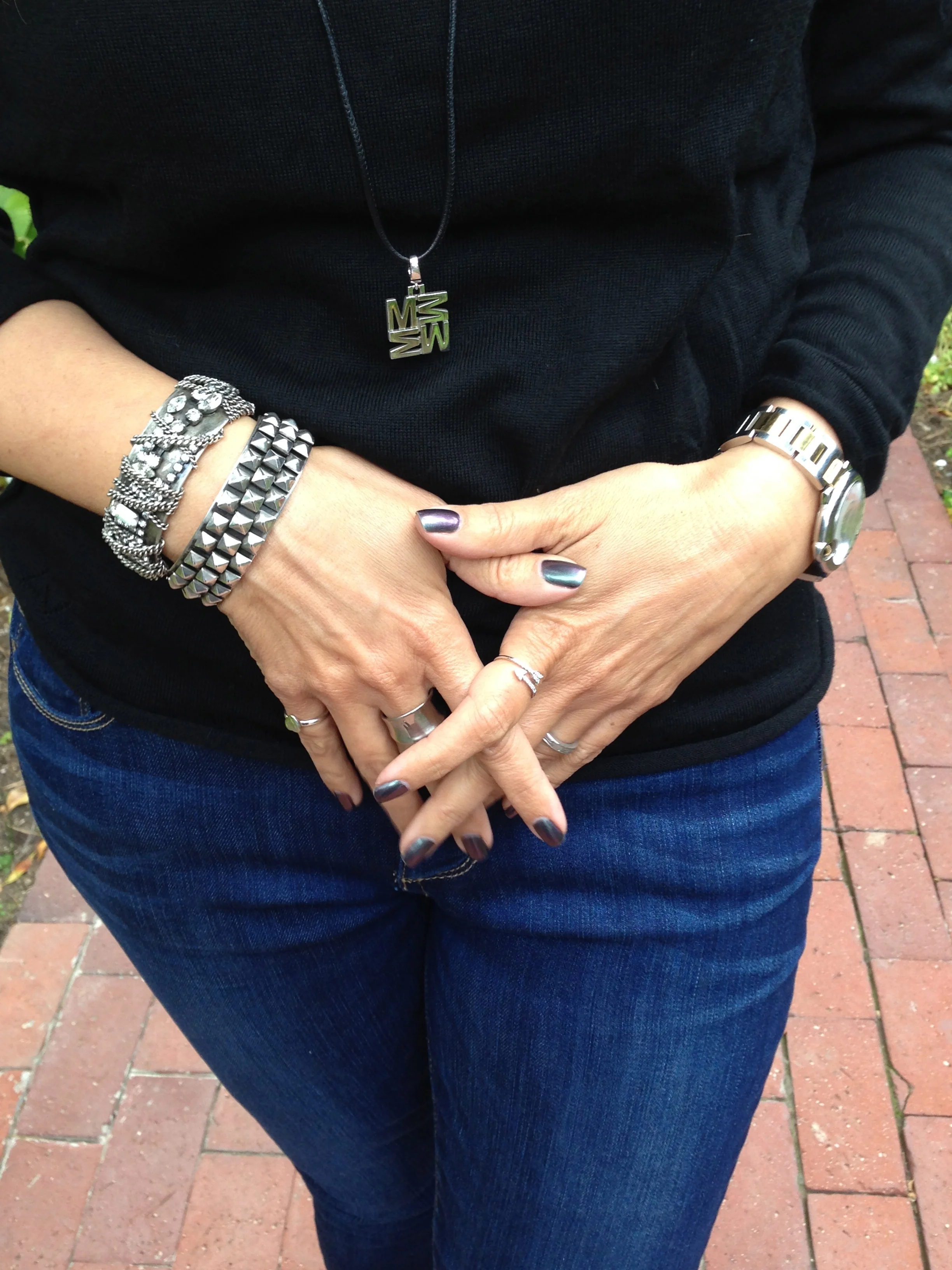 Love Letters Initial Necklace by India Hicks , Cuff bracelets by Dannijo . Nail color is Peace, Love & OPI.