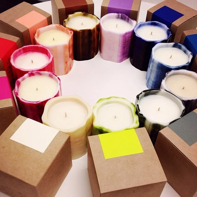 Le Feu de L'Eau Boutique luxury candles, $62 each. Dimension: 3.5" x 4". Approximate burning time is 80 hours.