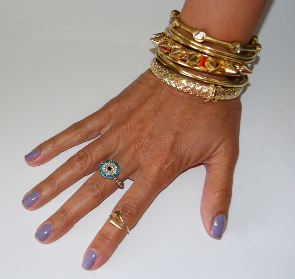 Wearing nail color Bangle Jangle by essie and some arm candy! The color has been around for a few years now, but still looks fresh!