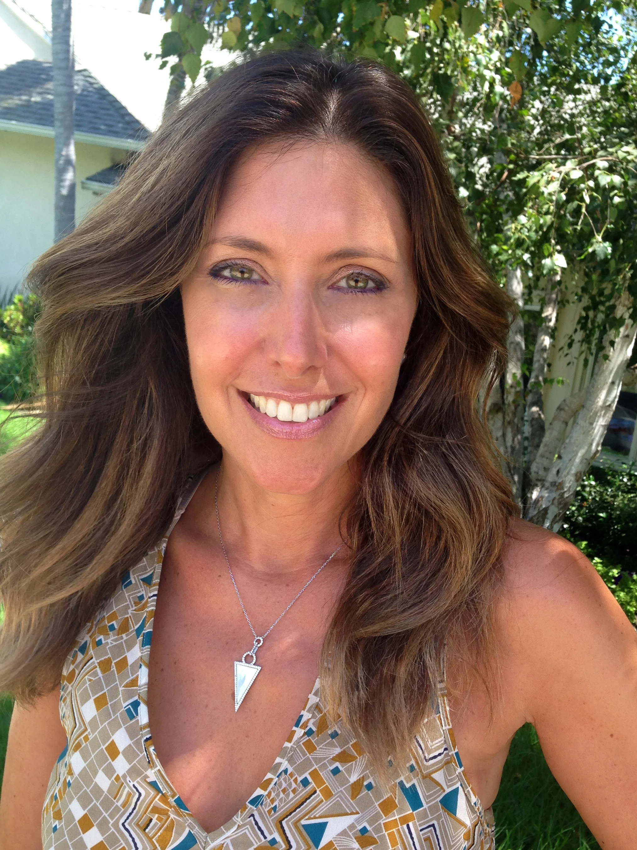 Lip cplor pictured:&nbsp;Laura Mercier Bare Pink Lip Gloss, $25.Necklace: Essie Collection, triangle mother of&nbsp;pearl, $90. Contact Esther@essiecollection.com&nbsp;to purchase.