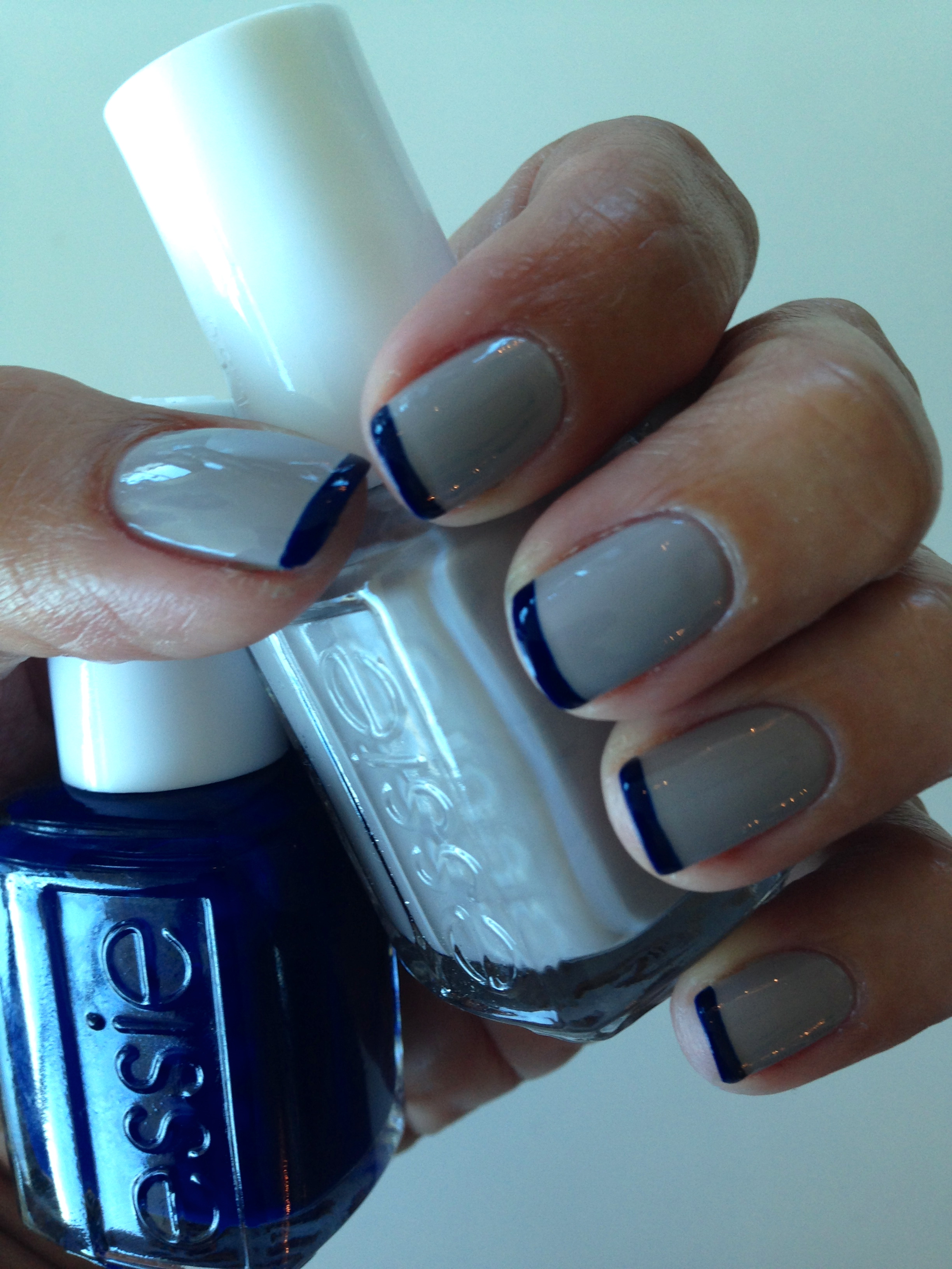 Nail color shown: Take It Outside, $8.50. Blue Tips: Style Cartel, $8.50. Both shades from the new Fall 2014 collection by essie.