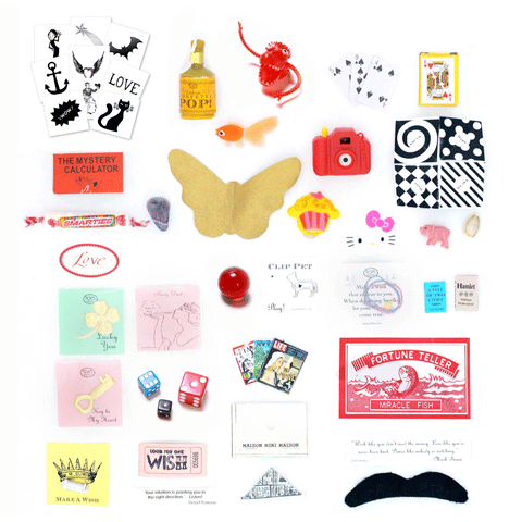 Surprises inside vary by style and may include a vintage-inspired toy, keepsake, charm, gem, sweets, confetti popper, fortune, temporary tattoo, quote and more. 