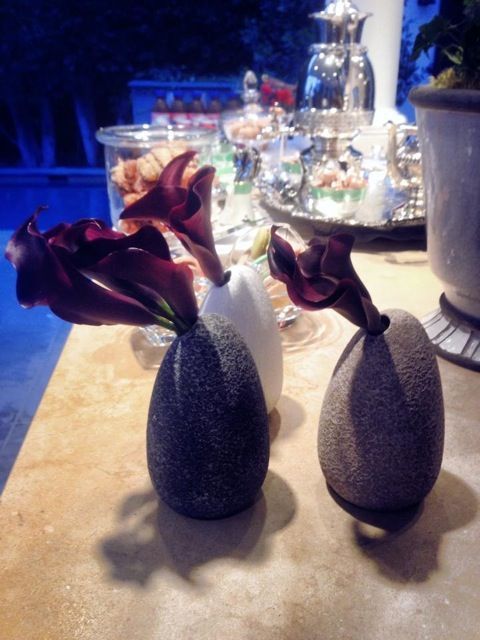 Vases shown from a dinner party at the home of Shelley Zalis. Ostrich Egg Vase (Gray, White, Sand), $25 each