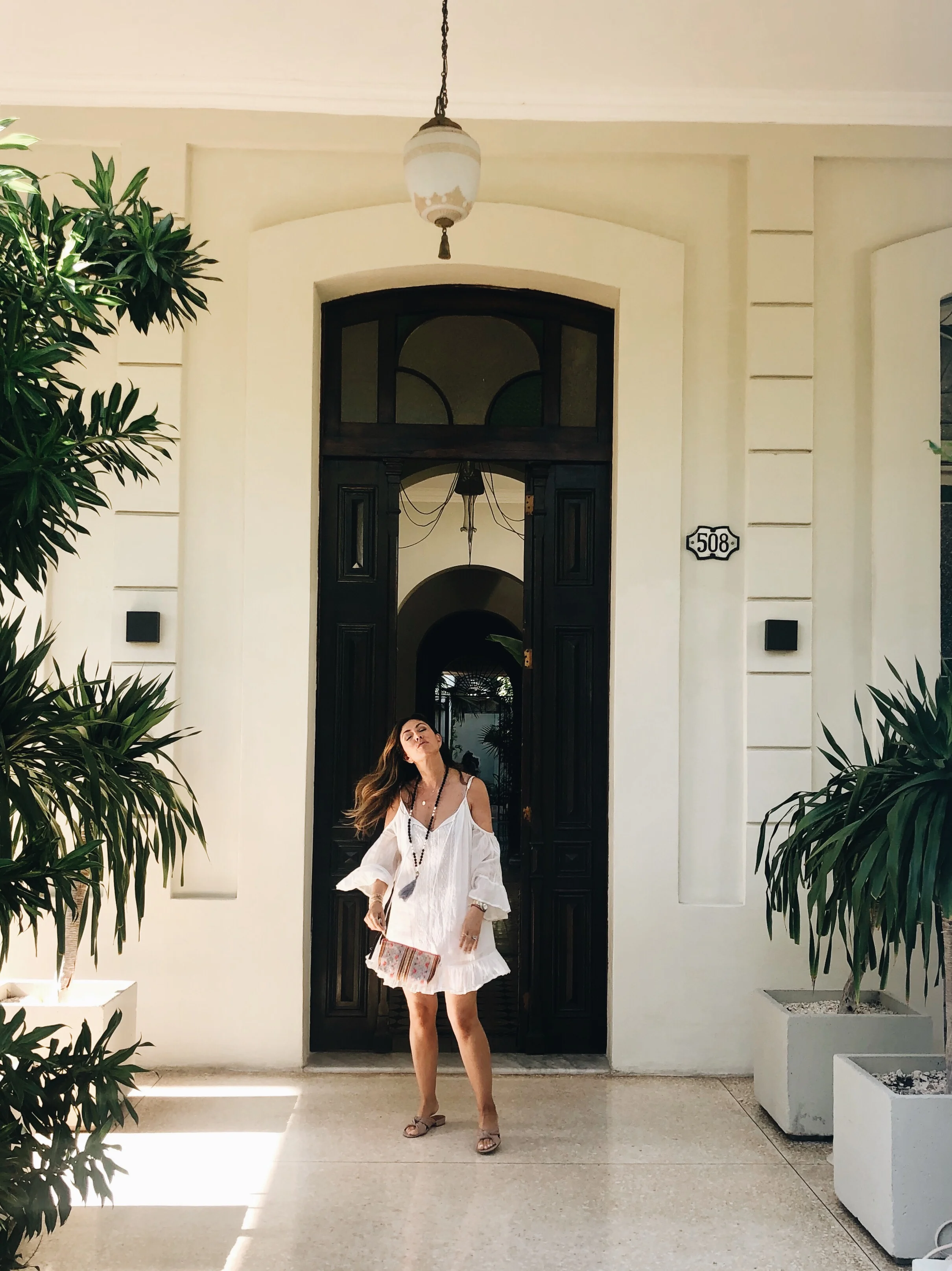 Adrianne Tassel Necklace by Anthropologie. Dress by Marina St. Barth.