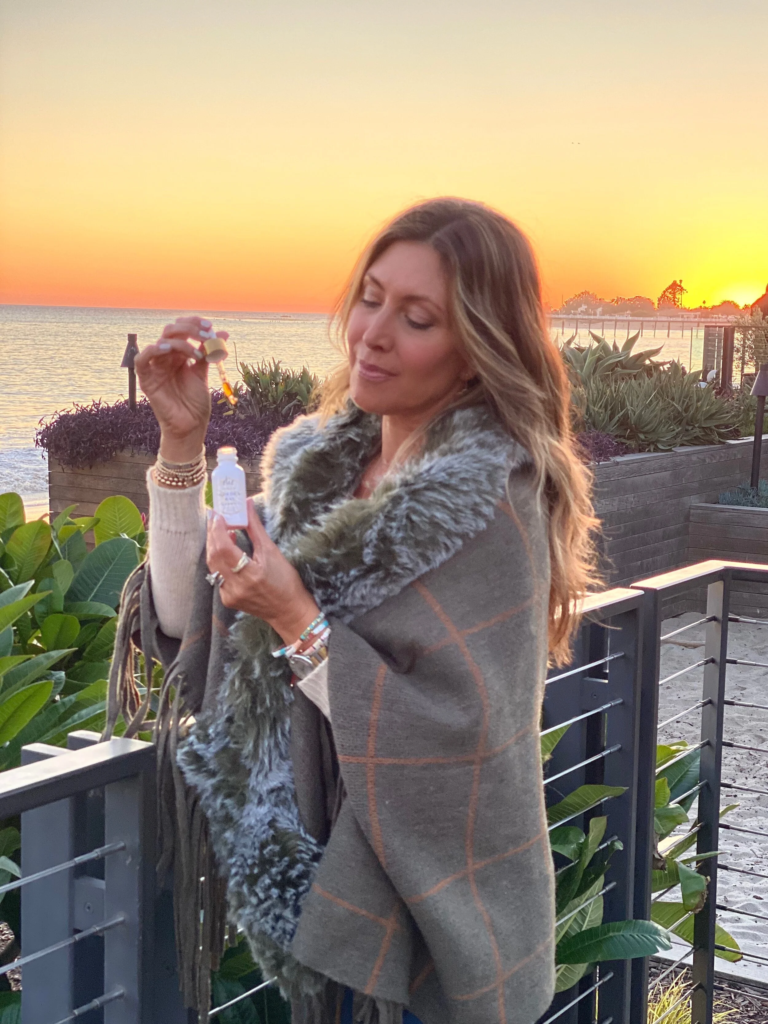 Melissa Meyers X Olie Golden Ray Glow Drops. Wrap by Franne Golde.