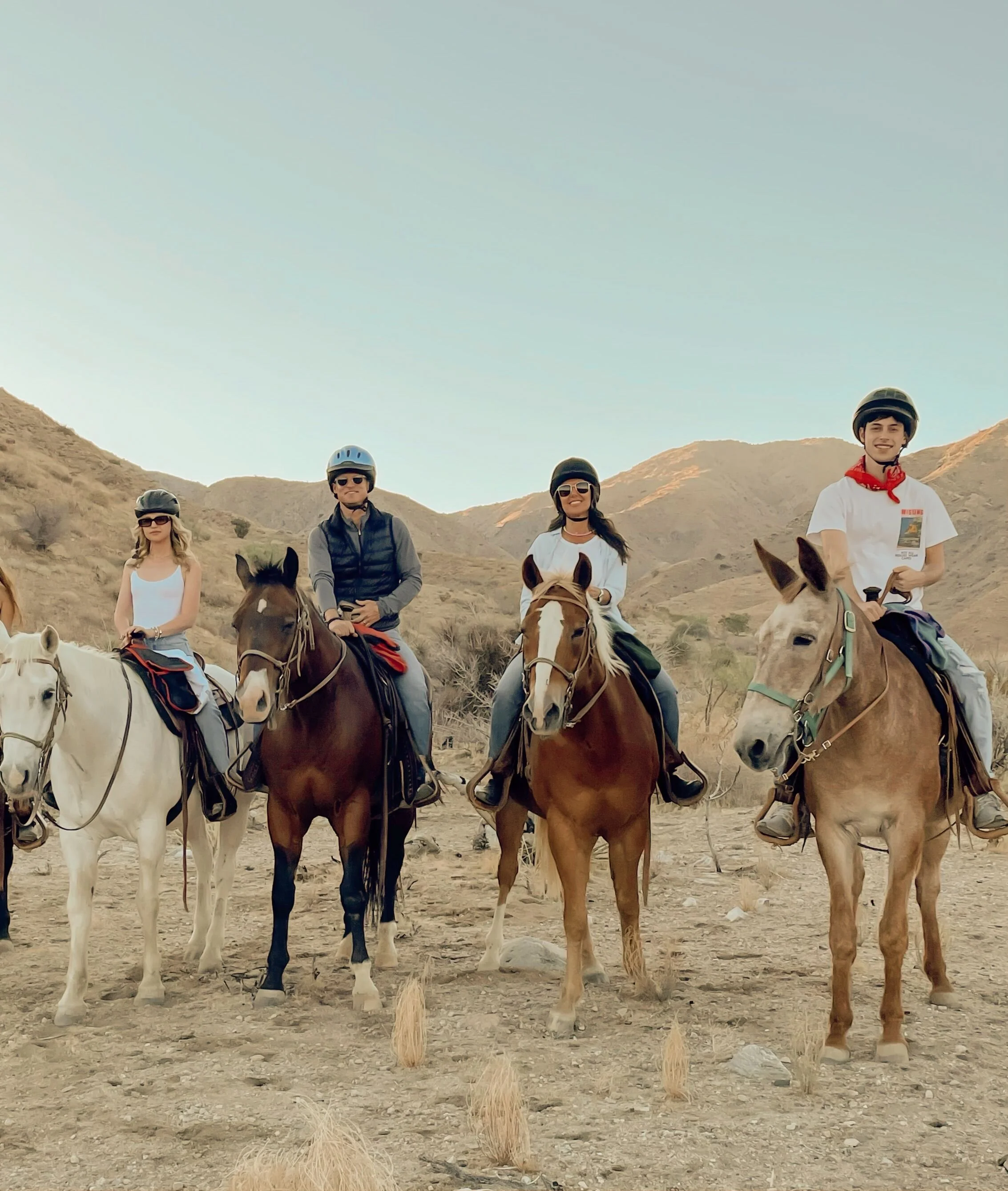 Sunset horseback riding experience organized by The Yoga Barn Ranch.