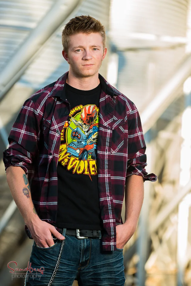 Quade chose an industrial/rustic/urban look for his senior portraits